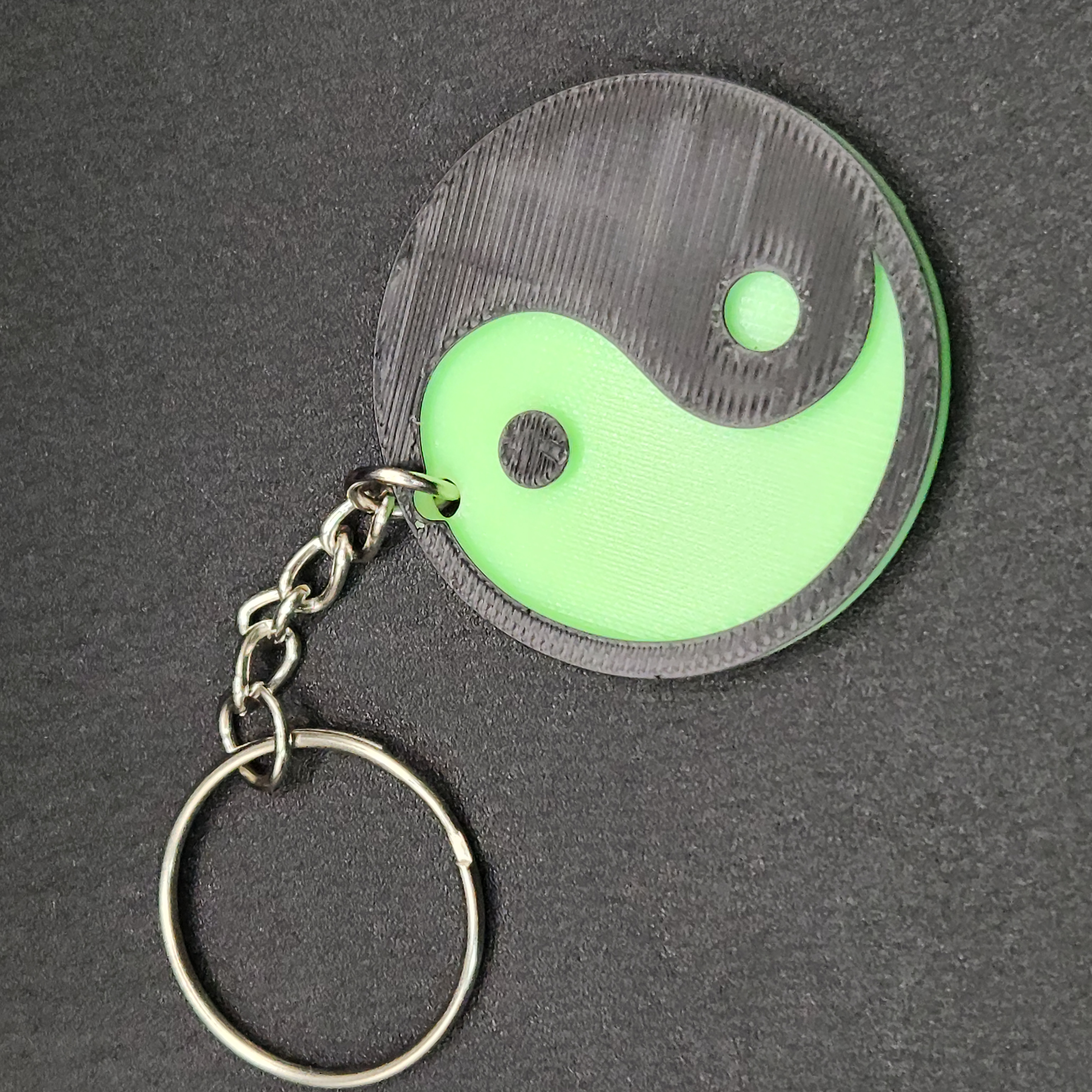 Glow in the Dark Green and Black Yin Yang Keychain