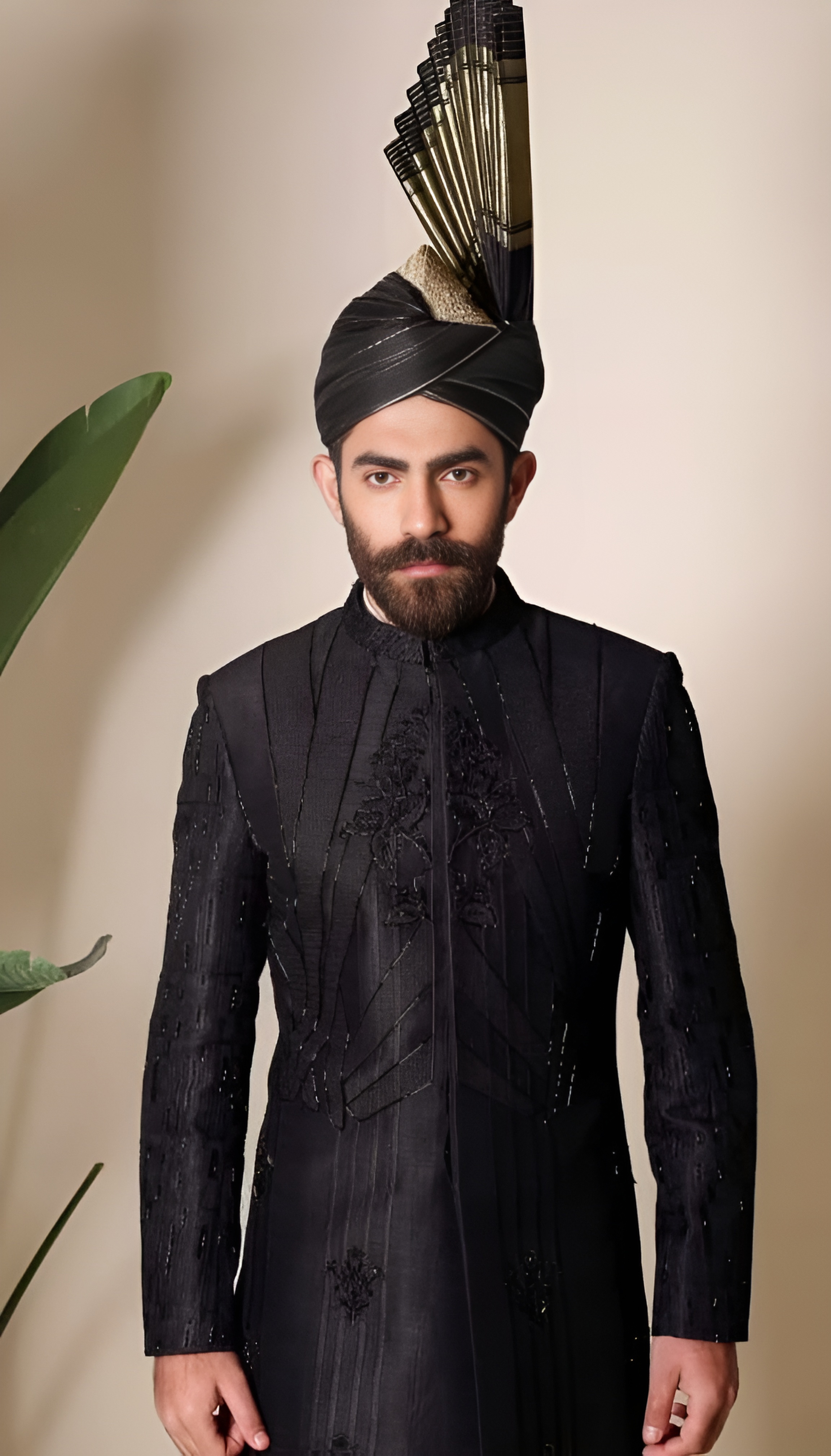 Regal Black Sherwani with a Striking Turban.