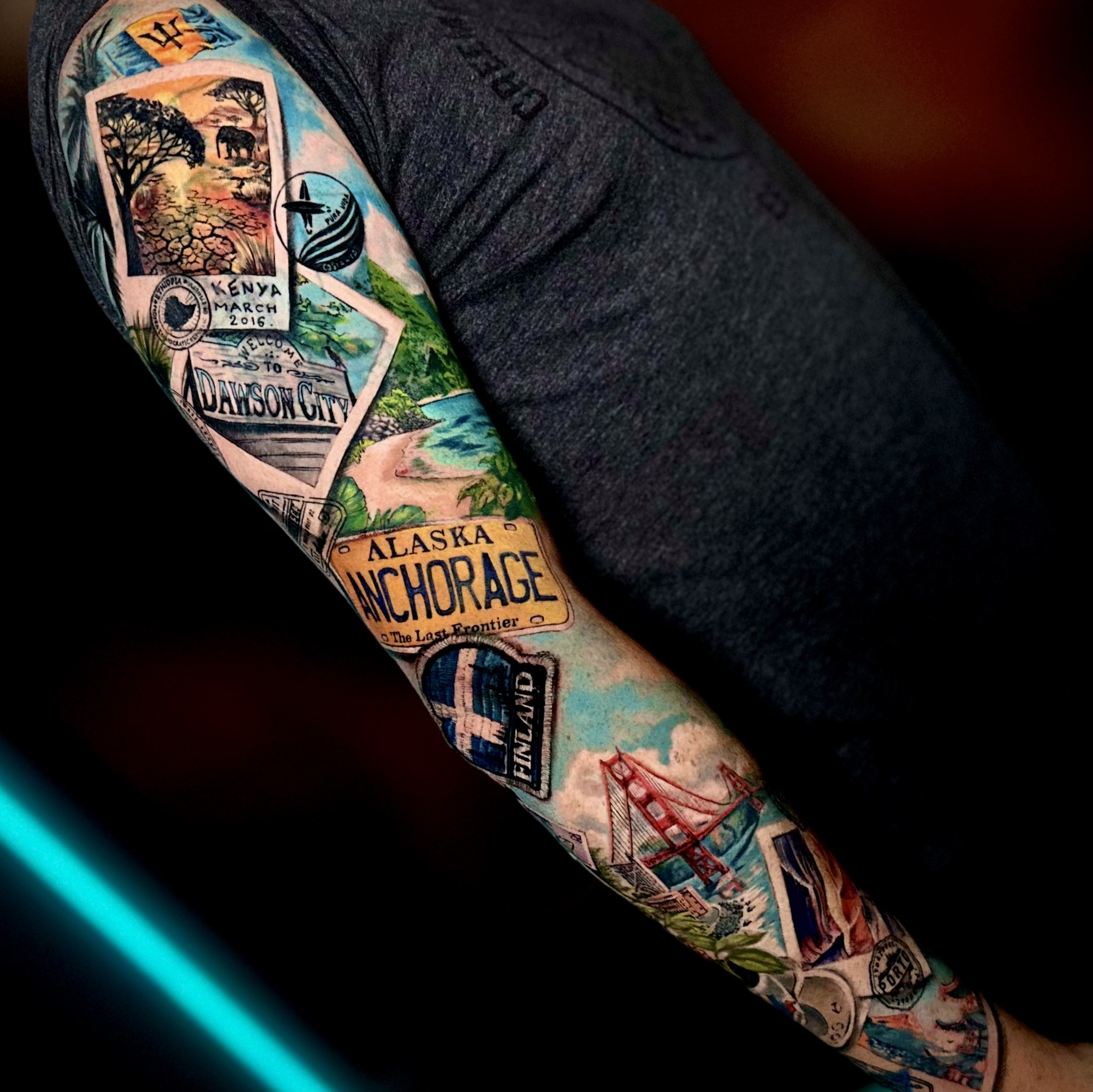 Travel-Themed Sleeve Tattoo