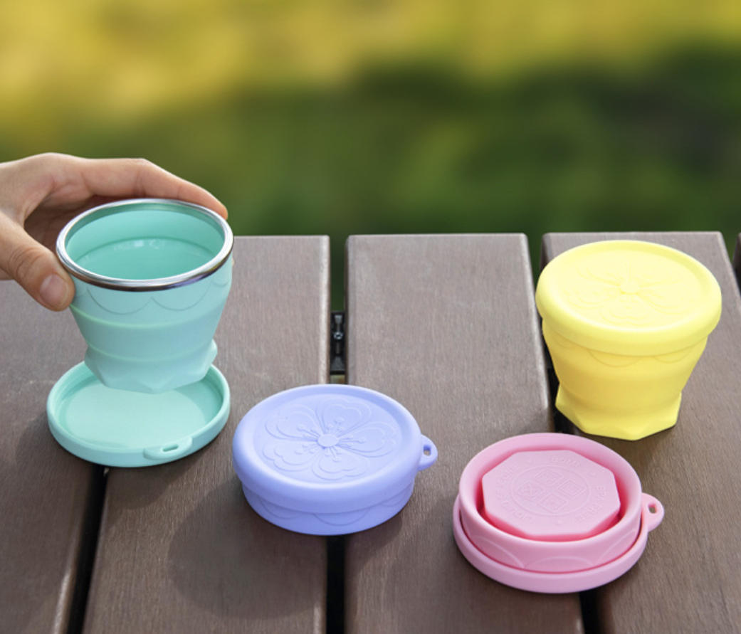 BUYUER Collapsible Silicone Cup 180ml – Portable Travel Cup with Press-To-Drink Lid, Food Grade Folding Cup for Outdoor Camping, Hiking & Daily Use – Leakproof Space Saving Cup for Hot/Cold Drinks (Sakura Pink)