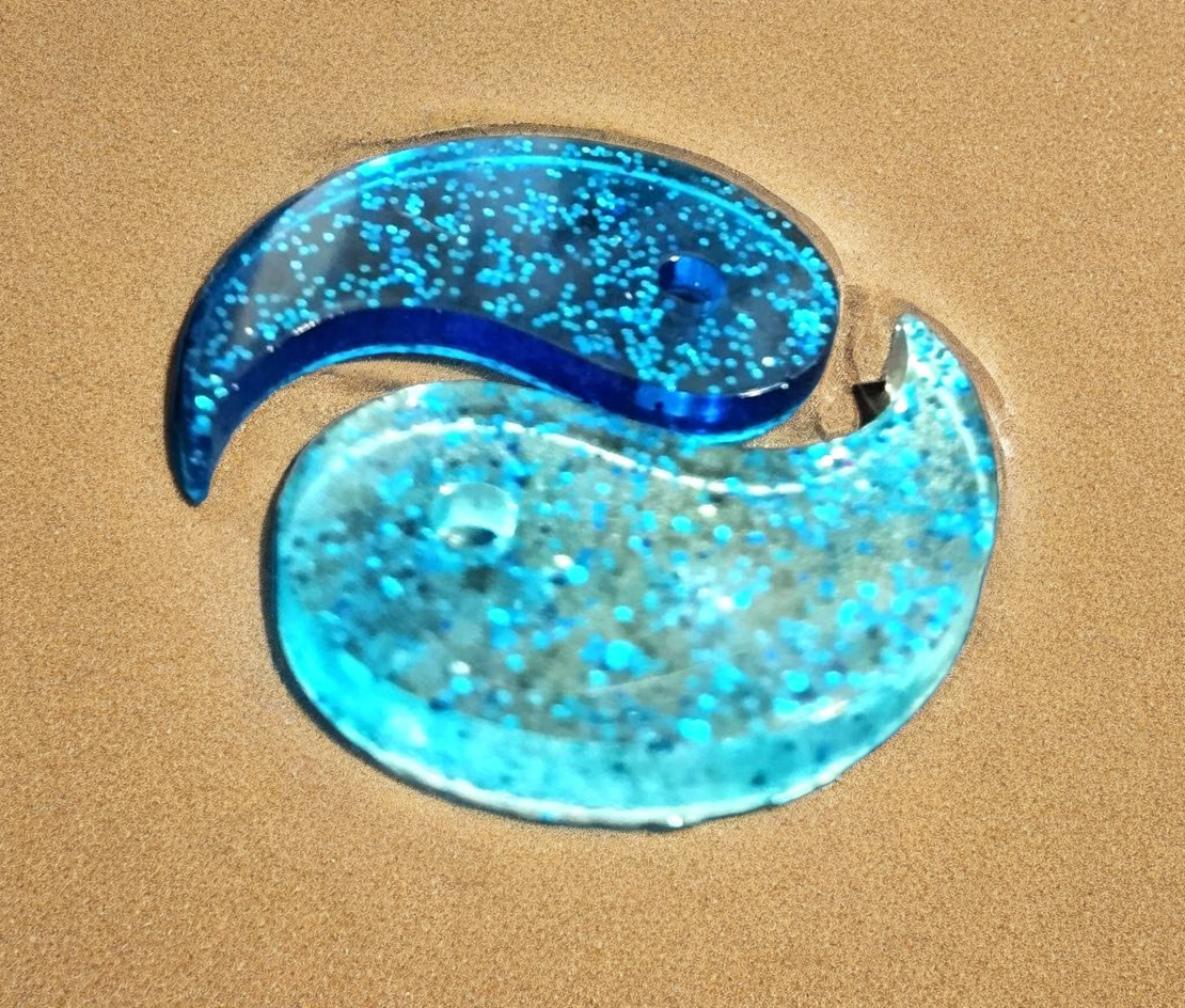 Le yin et le Yang bleu et paillettes