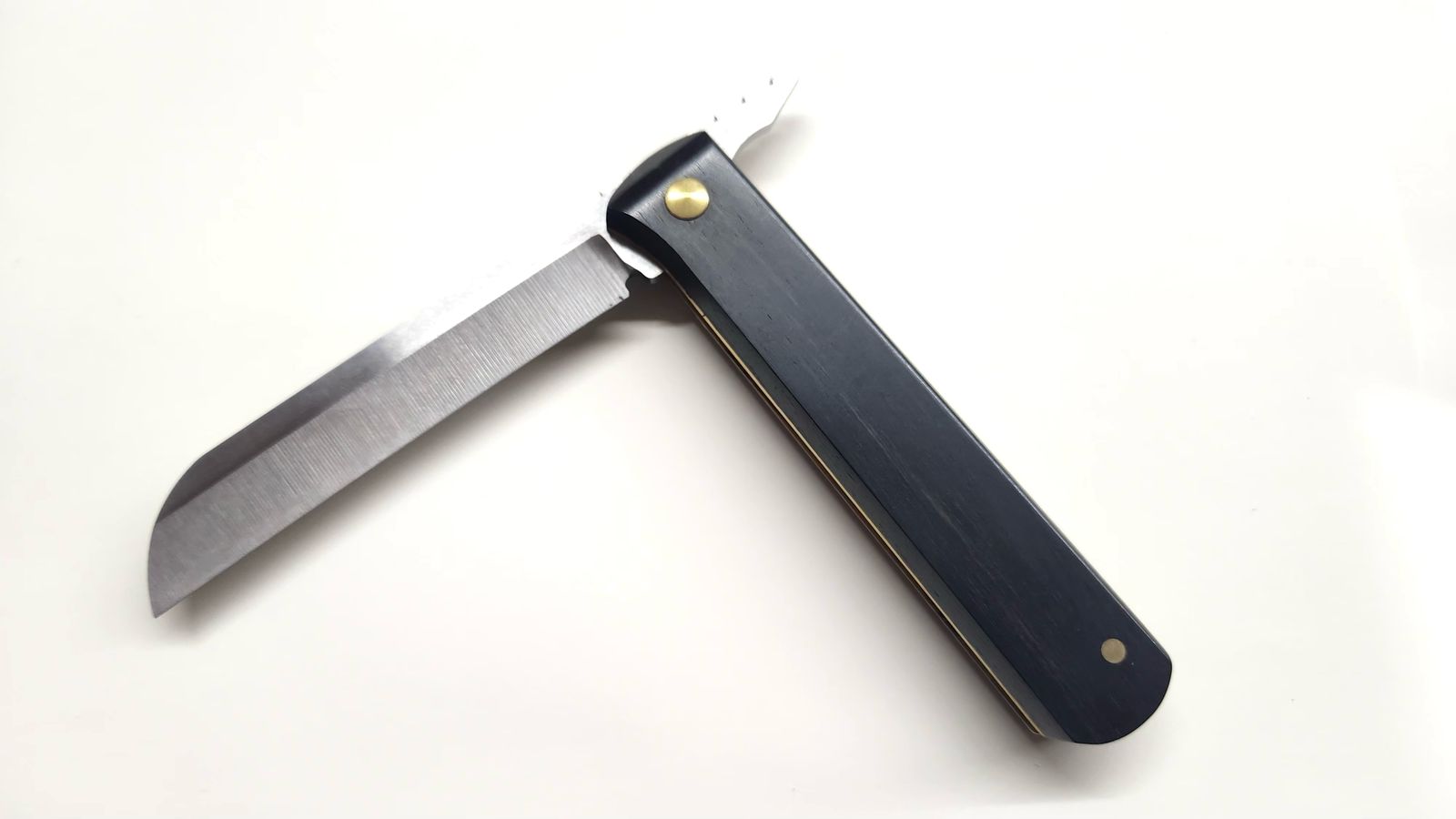 Faca dobrável chanfro duplo côncavo