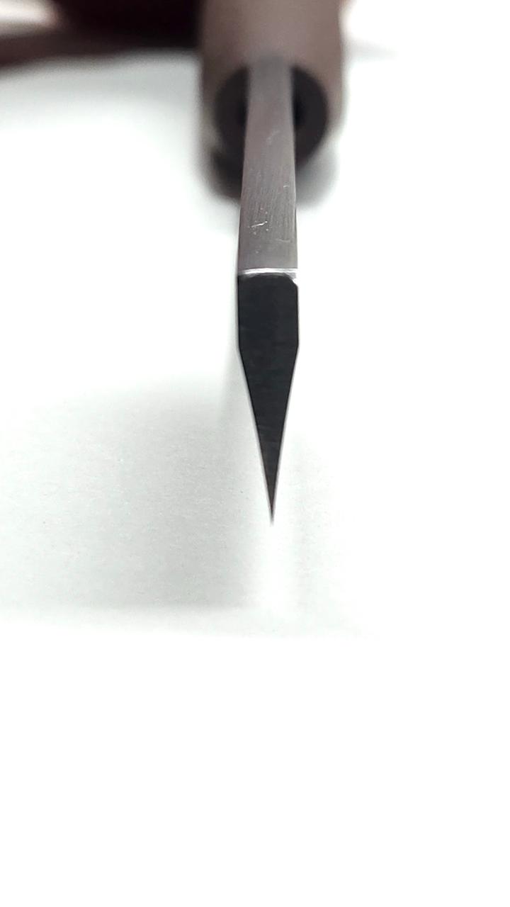 Faca chanfro duplo côncavo