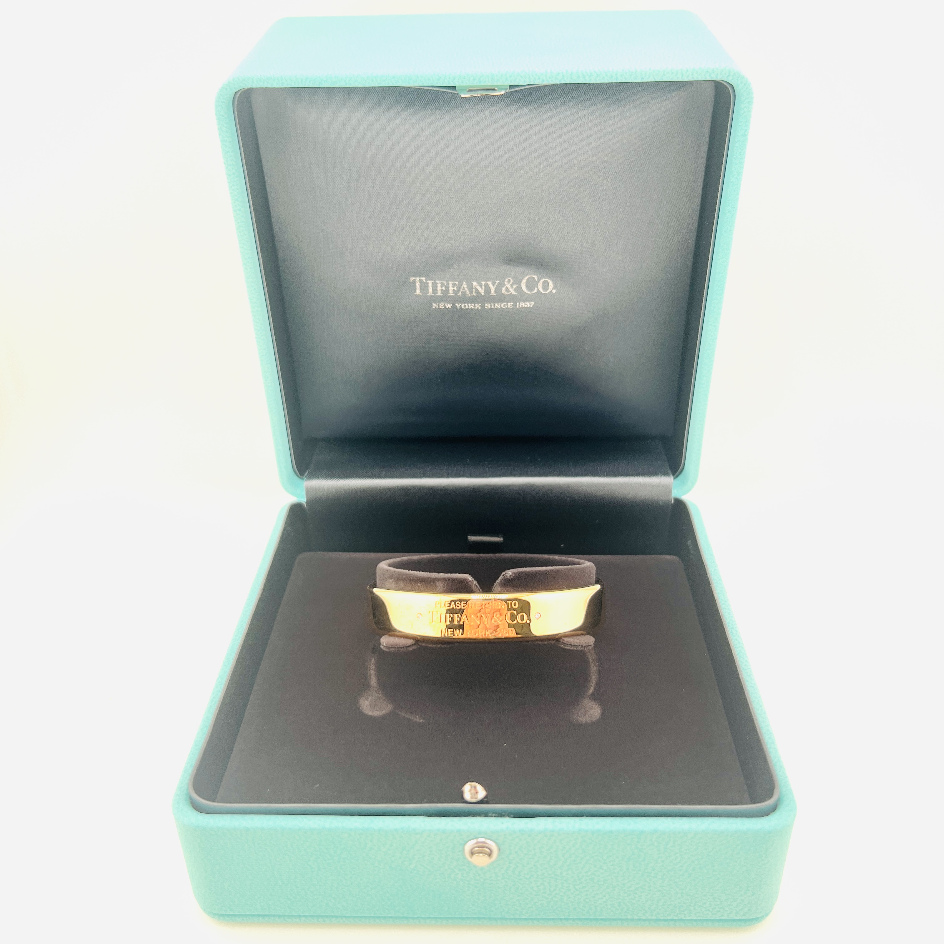 Tiffany & Co. cuff bangle bracelet in 18K Rose gold with diamonds