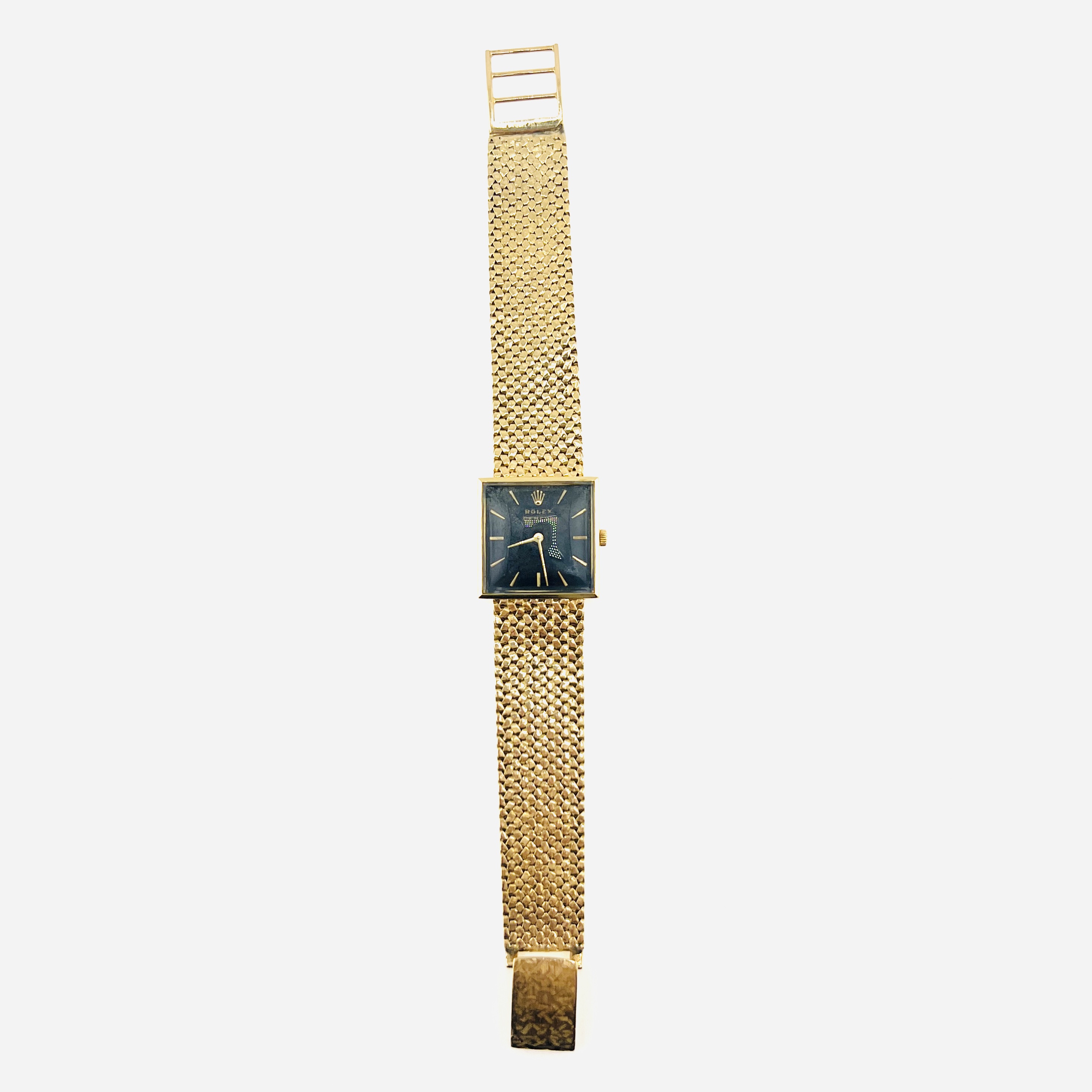Vintage Rolex mechnical watch in 18K gold case and mesh bracelet band