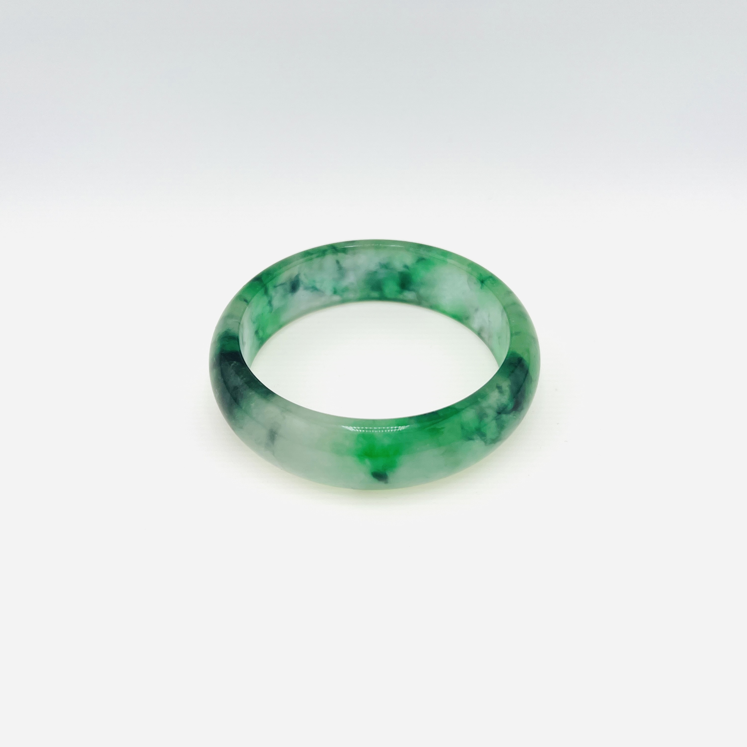 Natural Burmeses flowing flower green jadeite bangle, 59 mm
