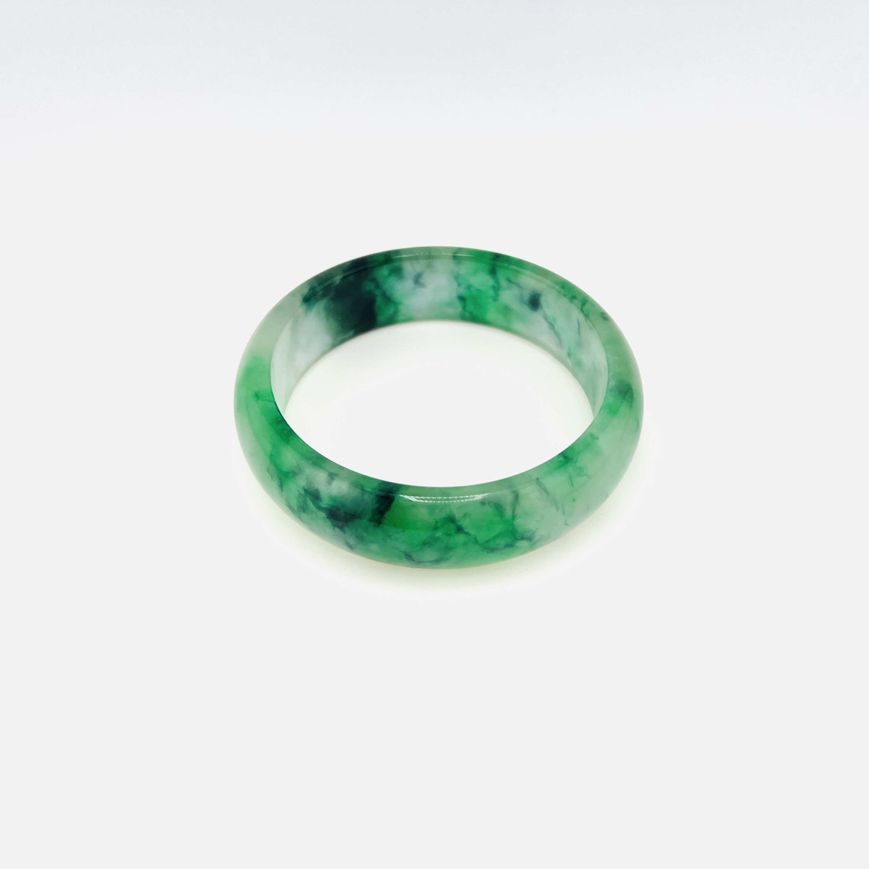 Natural Burmeses flowing flower green jadeite bangle, 59 mm