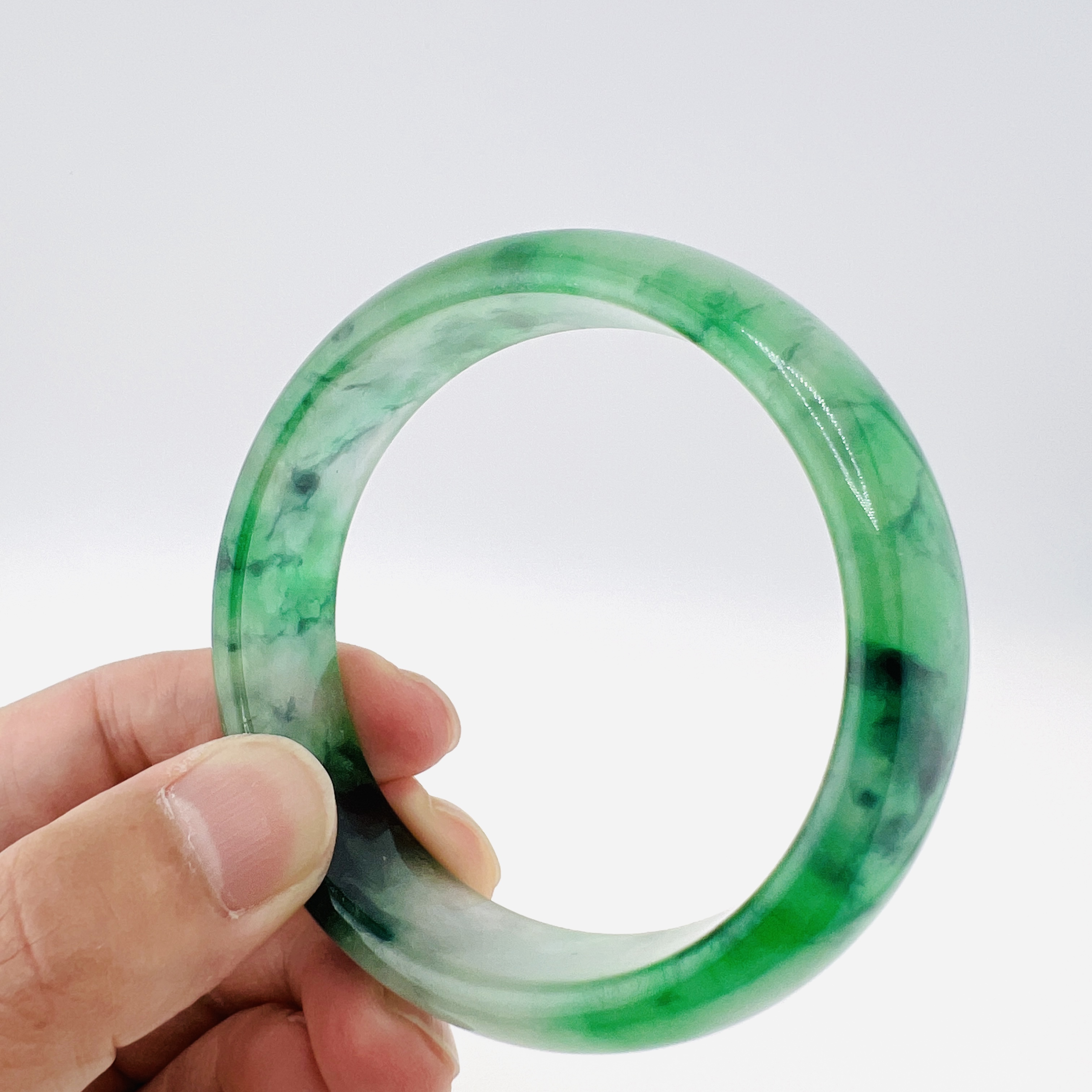 Natural Burmeses flowing flower green jadeite bangle, 59 mm