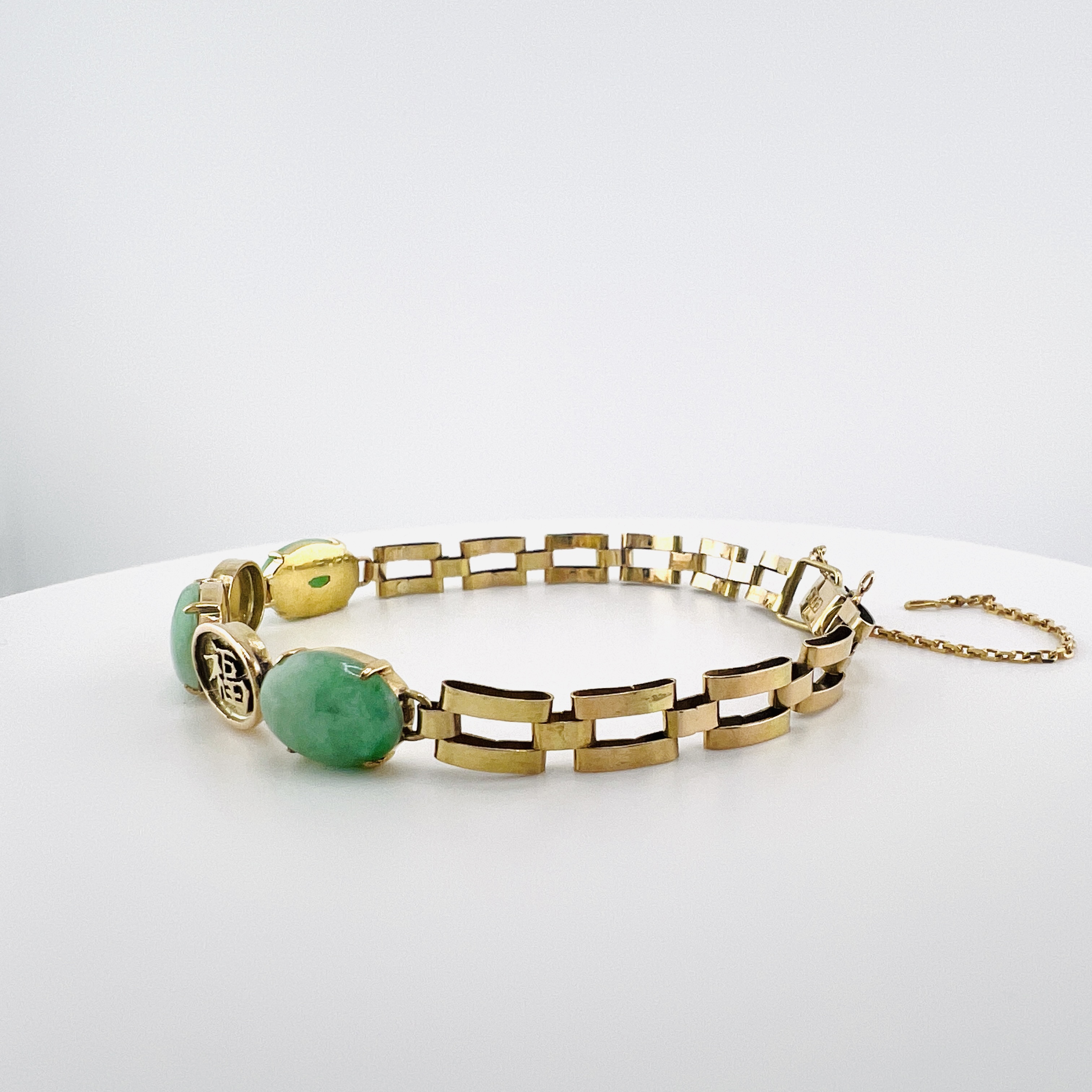 Natural green jadeite cabochon link bracelet in 18K gold