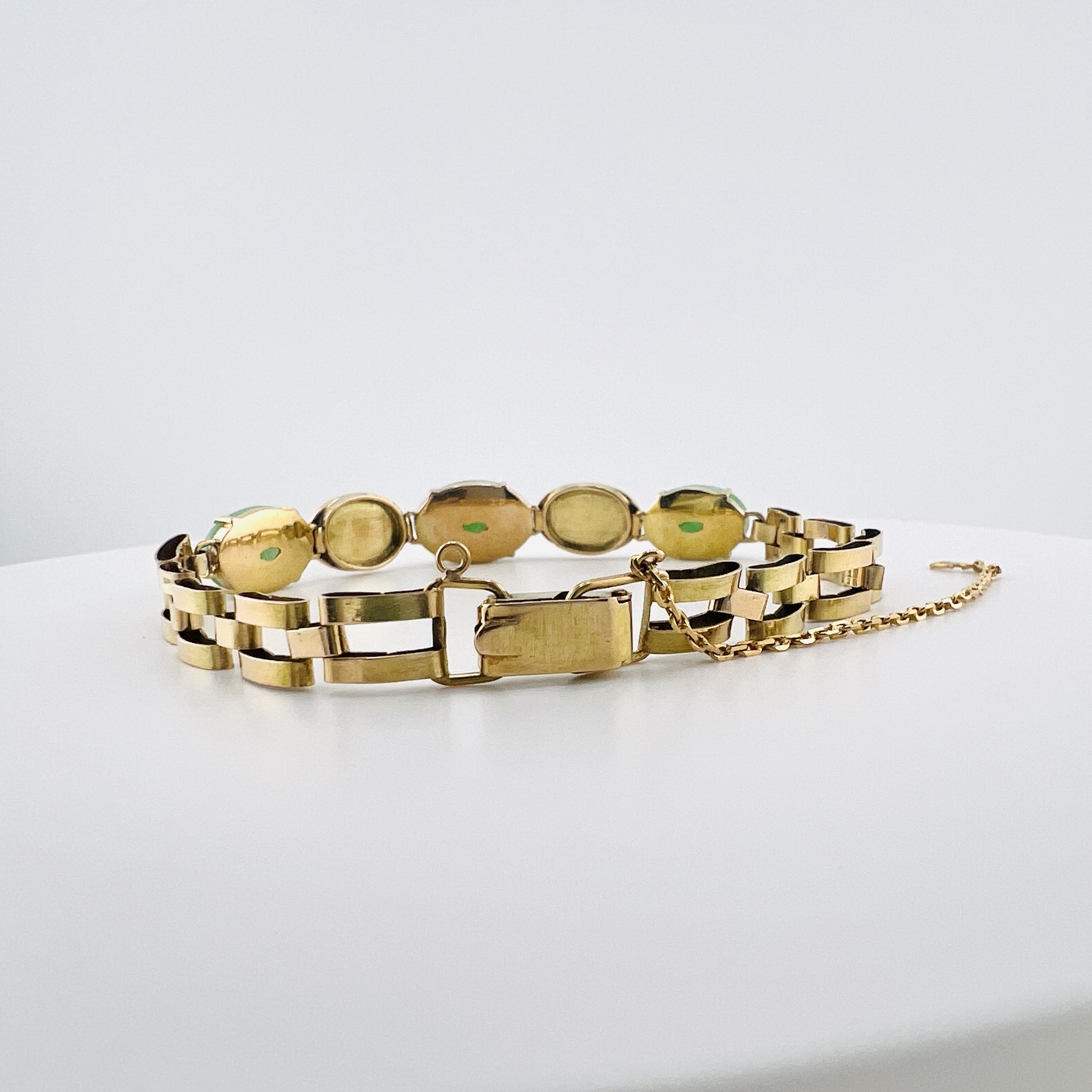 Natural green jadeite cabochon link bracelet in 18K gold