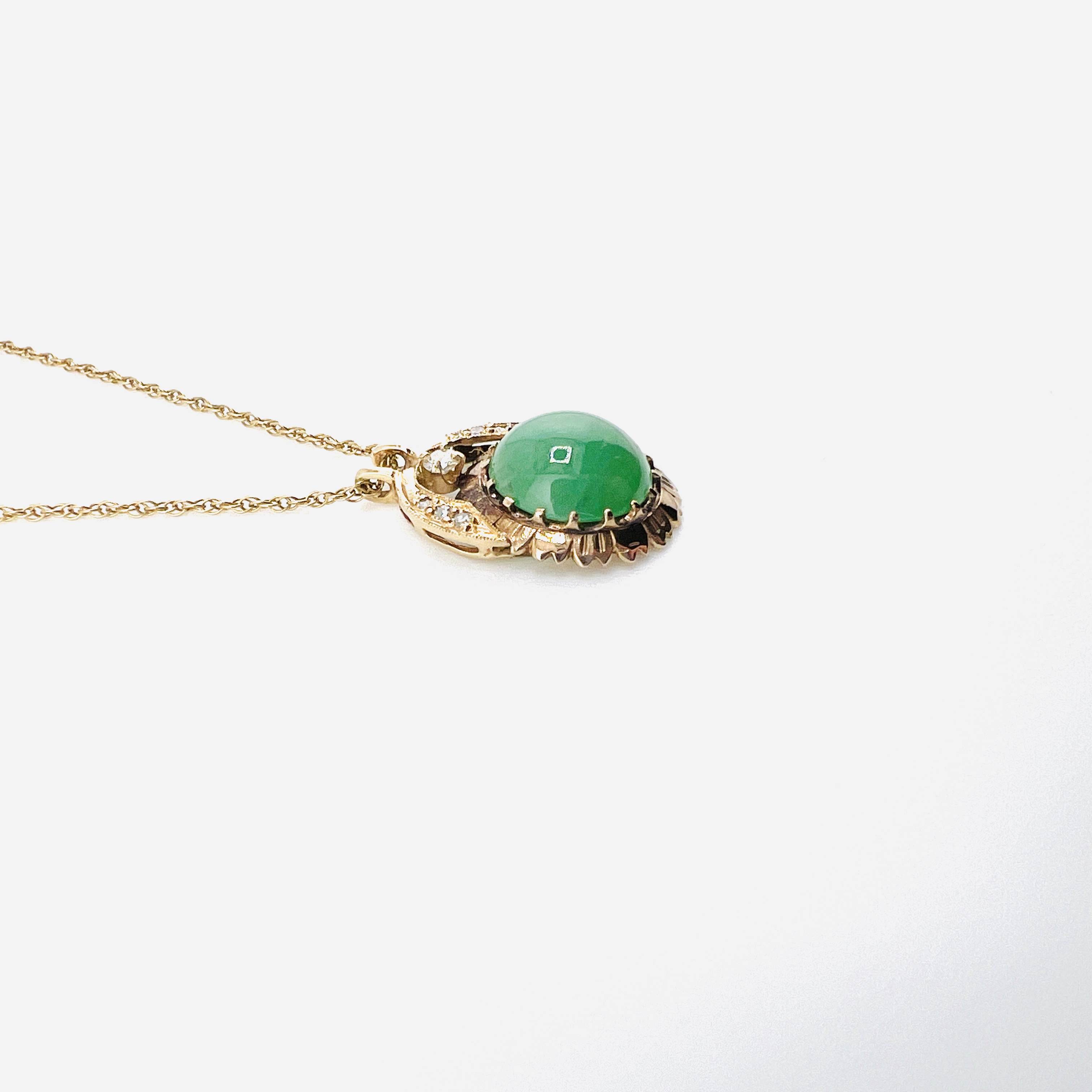 Vintage green jadeite cabochon and diamonds in a 14K gold chain necklace