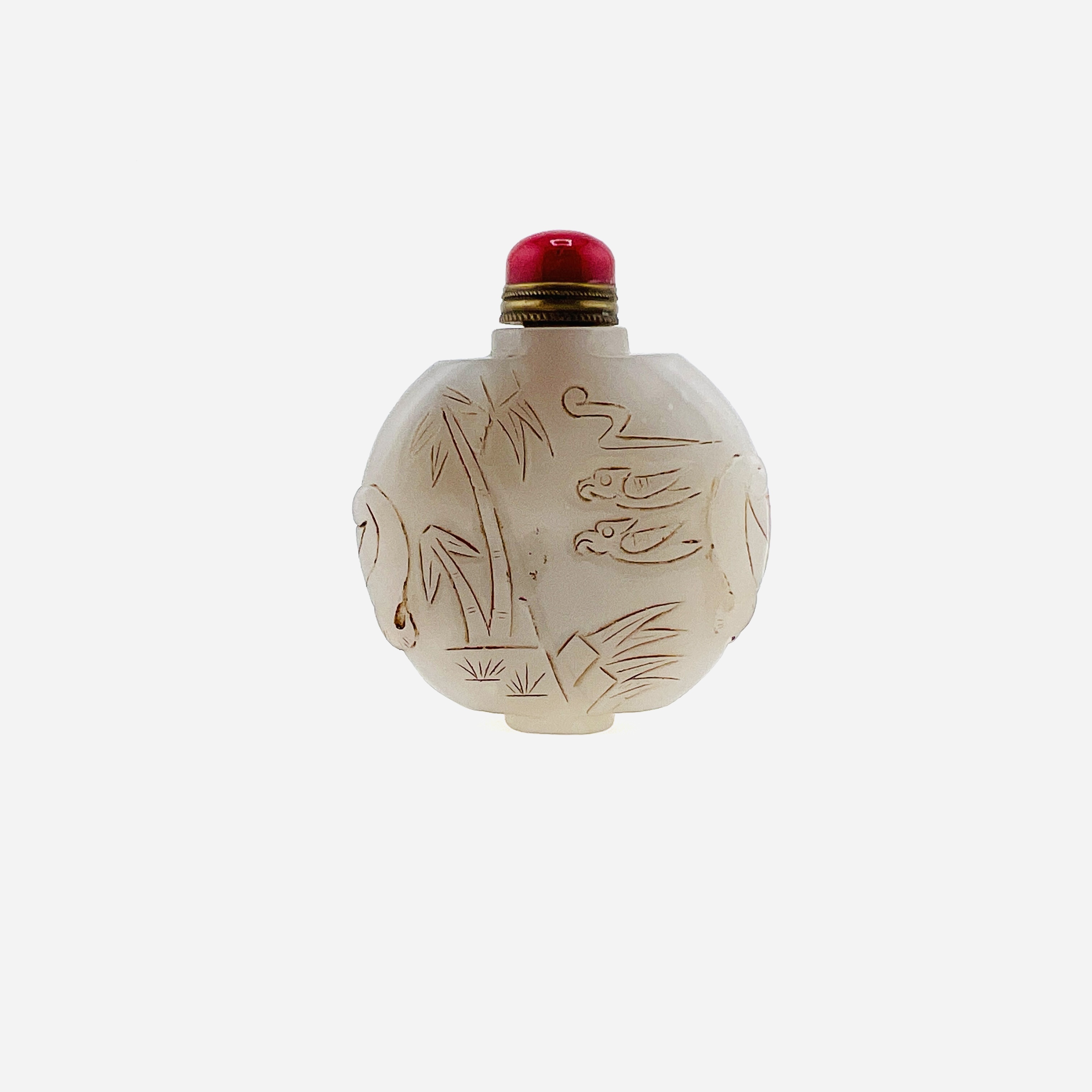 Antique white jade snuff bottle with both sides carved
