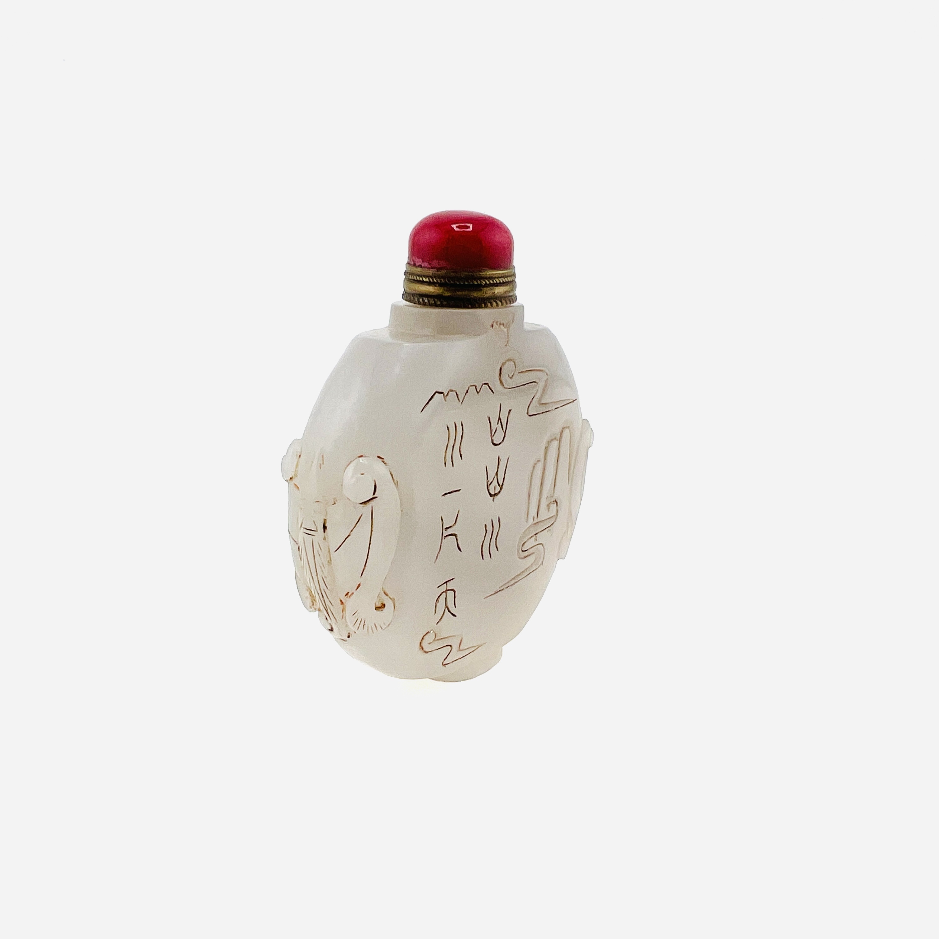 Antique white jade snuff bottle with both sides carved