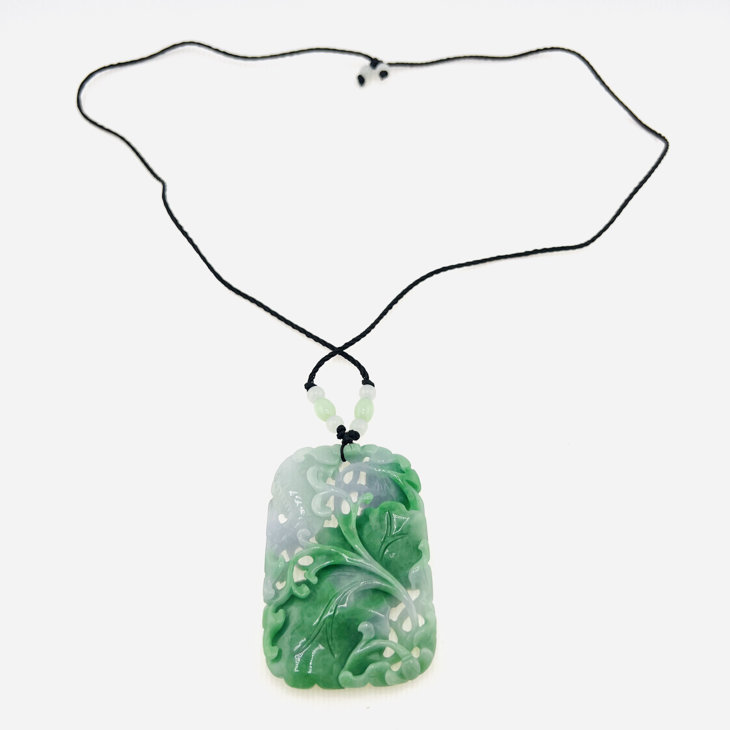 Natural green jadeite pendant necklace with double-side carving of netsuke fish, ruyi and lotus