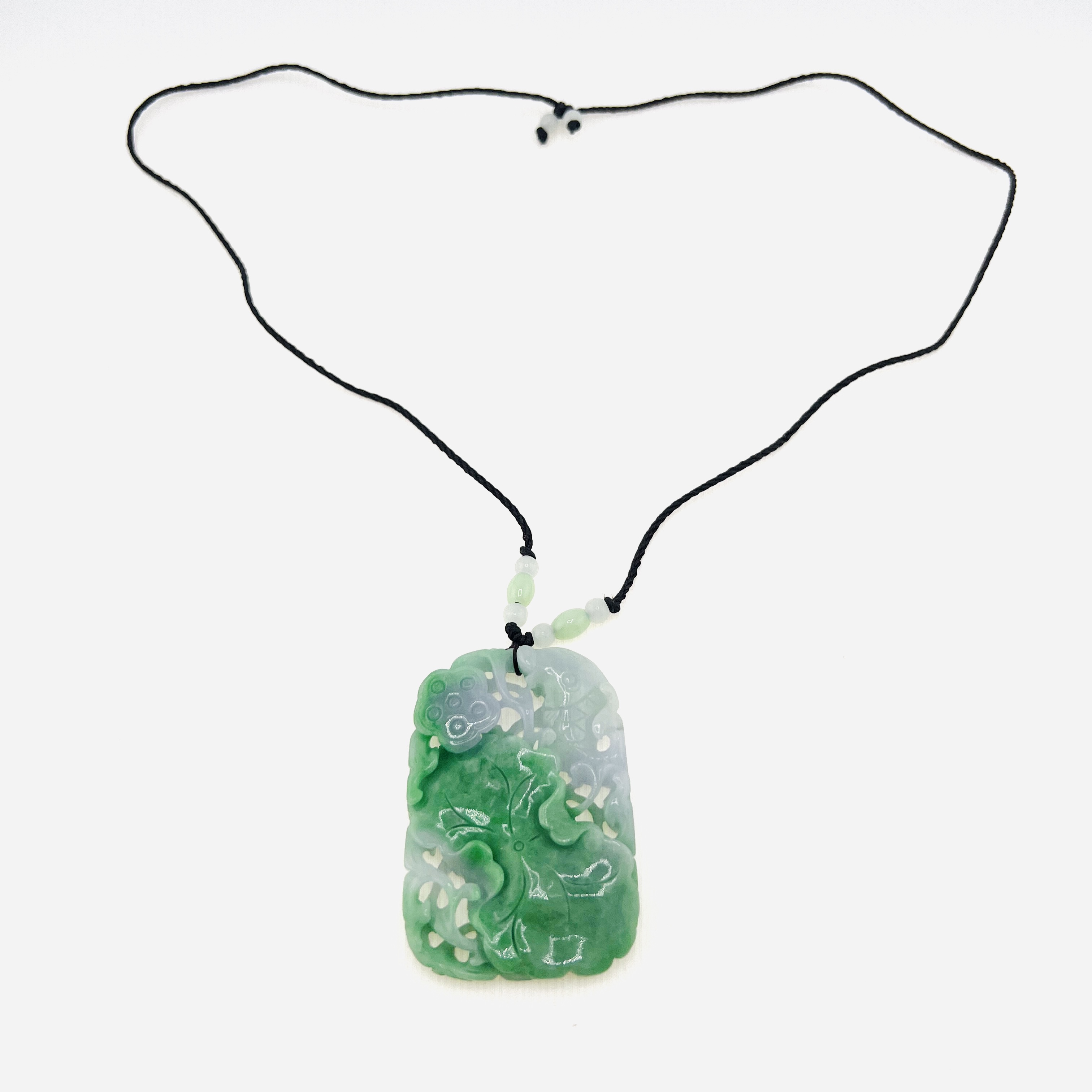 Natural green jadeite pendant necklace with double-side carving of netsuke fish, ruyi and lotus