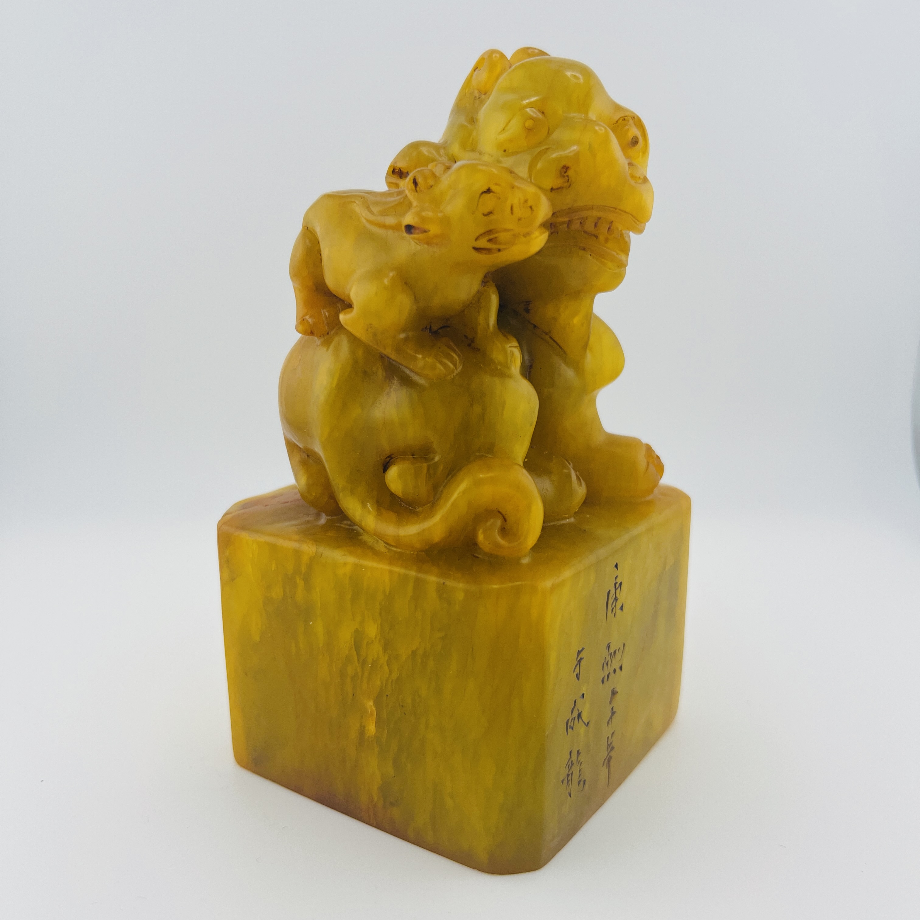 Tianhuang Shoushan stone seal with Foo dog lion with child stature seal