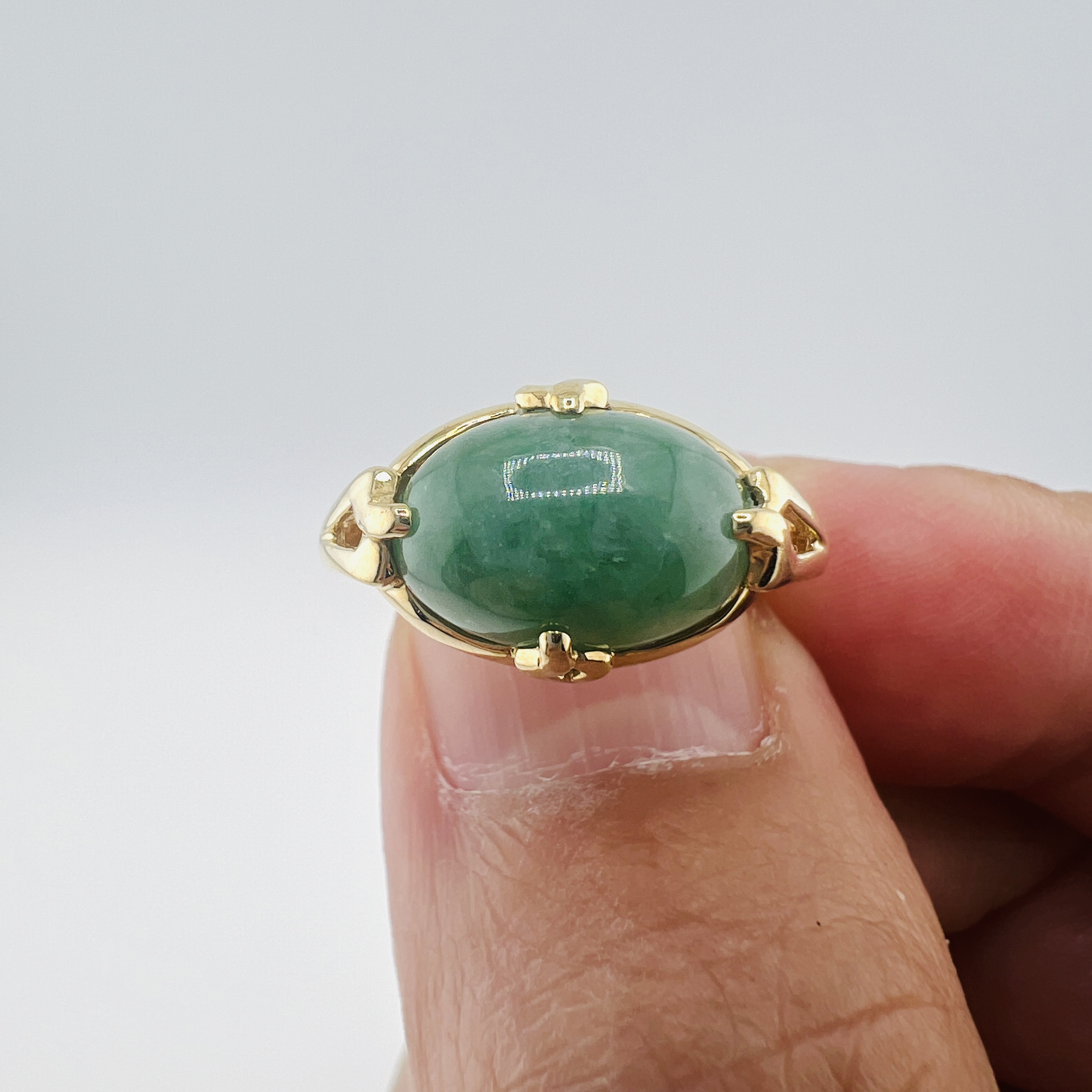 Green jadeite cabochon ring in 14K gold