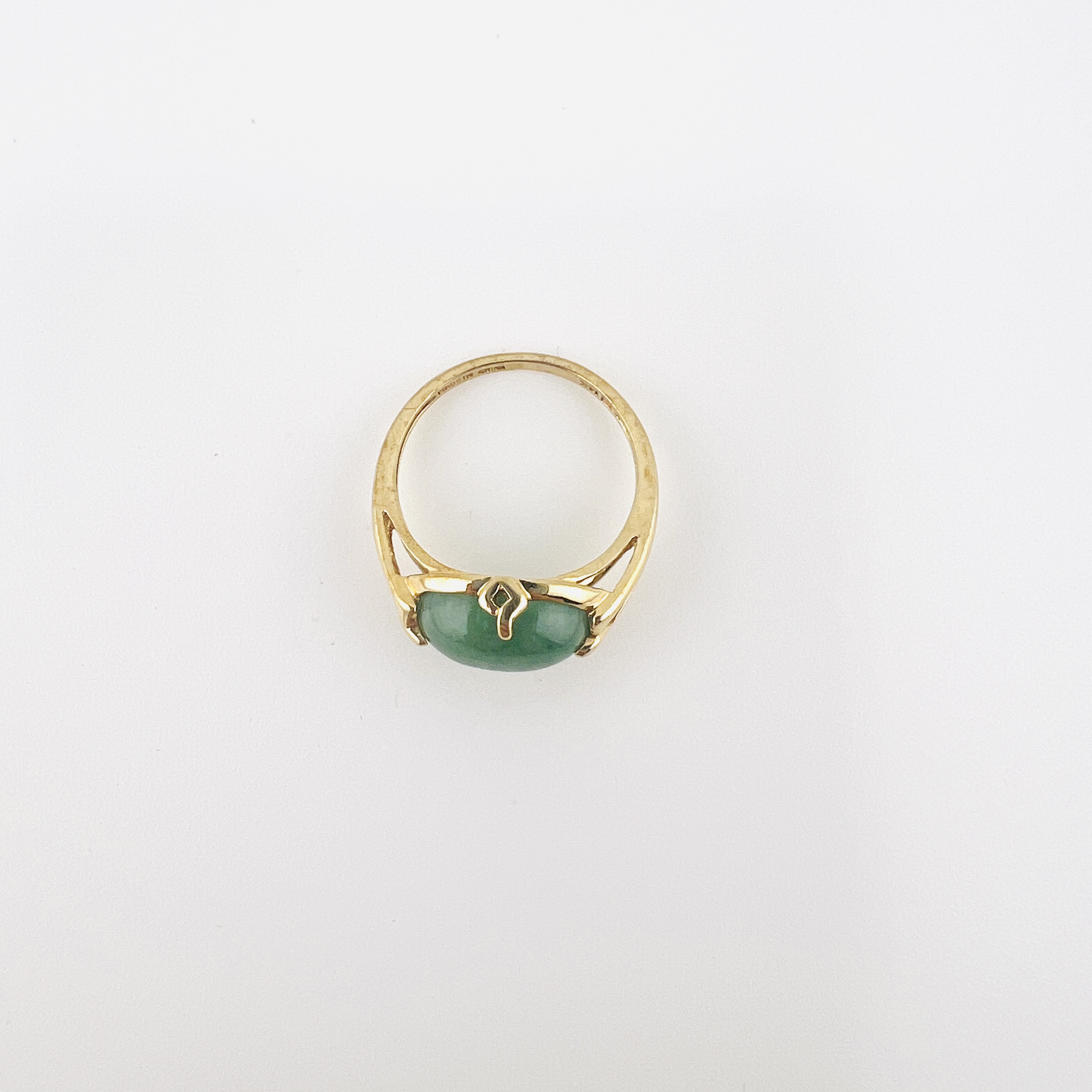 Green jadeite cabochon ring in 14K gold