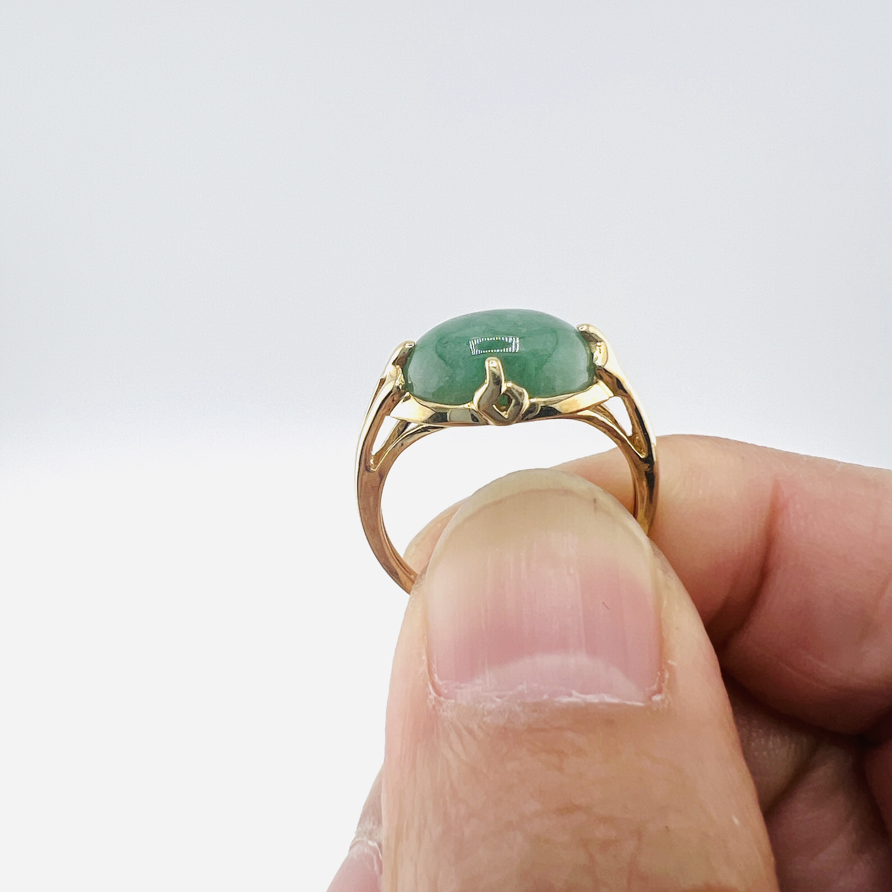 Green jadeite cabochon ring in 14K gold