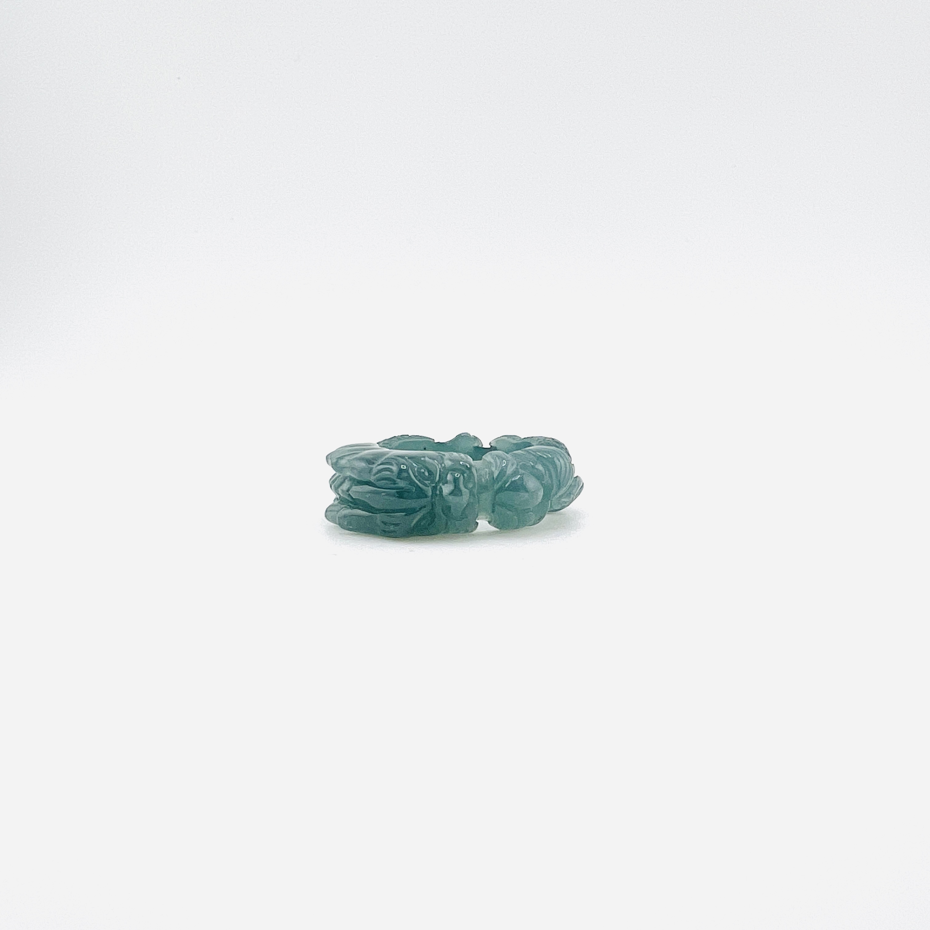 Blue jadeite band ring in full dragon design