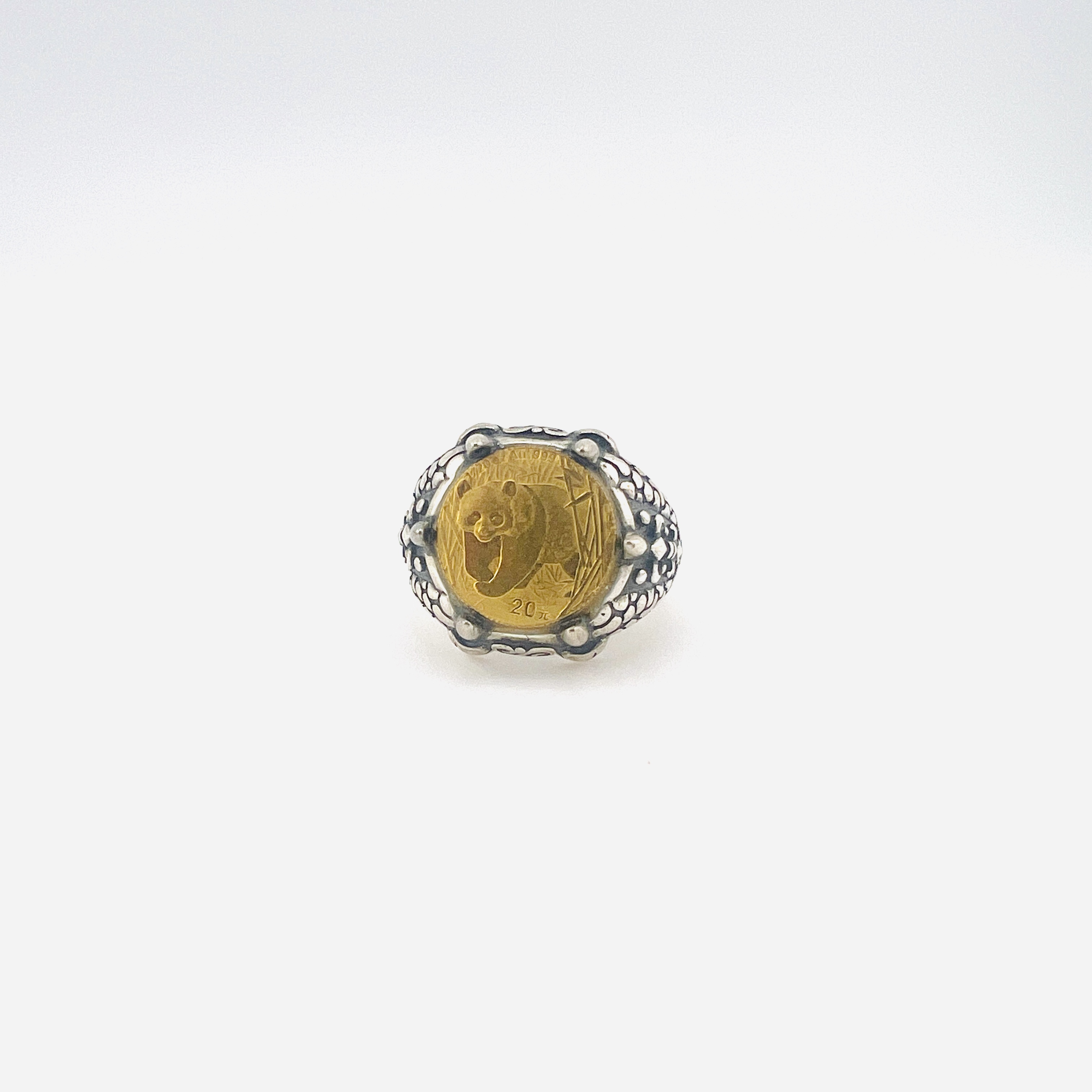 Gold Panda coin in dragon claws ring