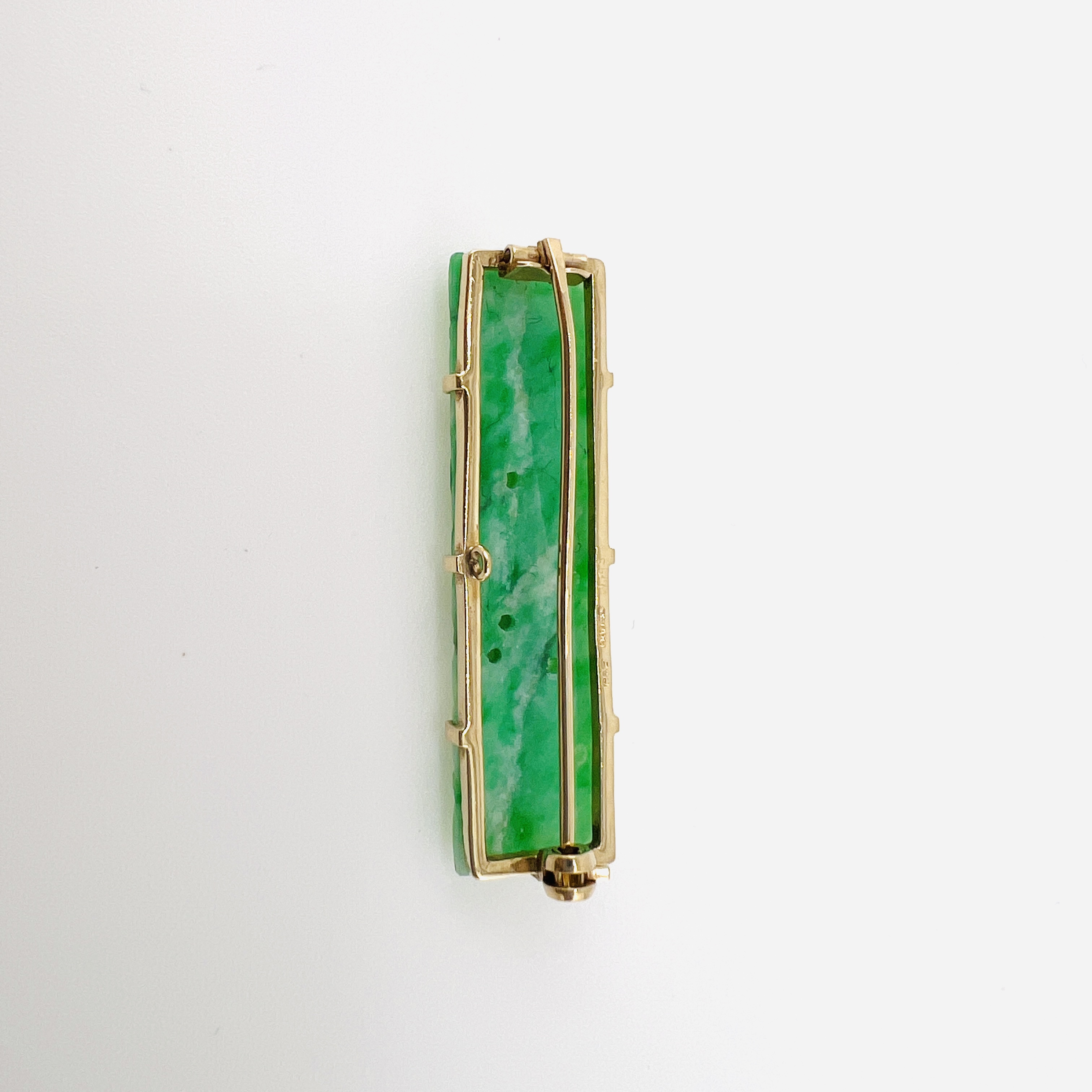 Green jadeite bar brooch in gold setting