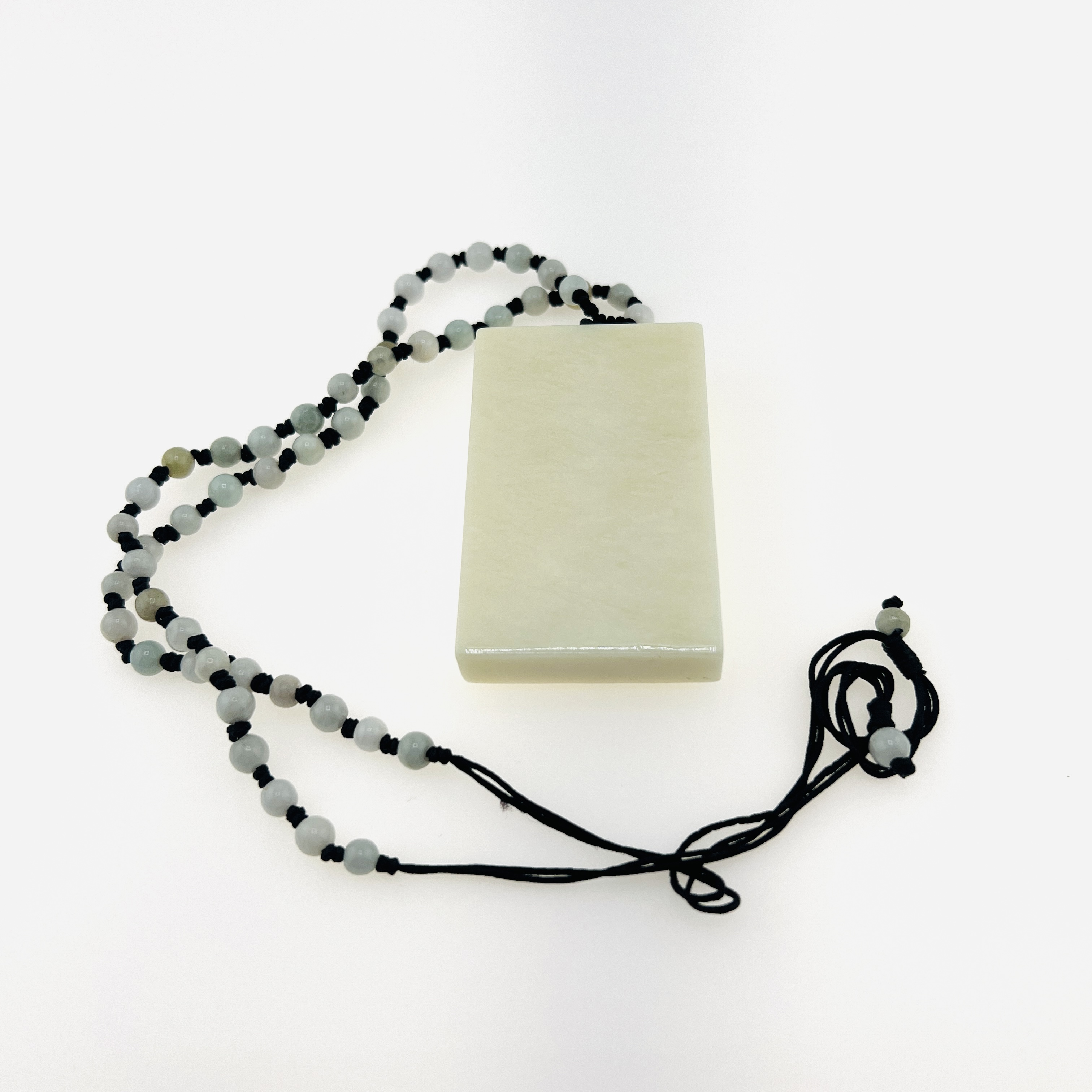 White jade lotus pendant necklace