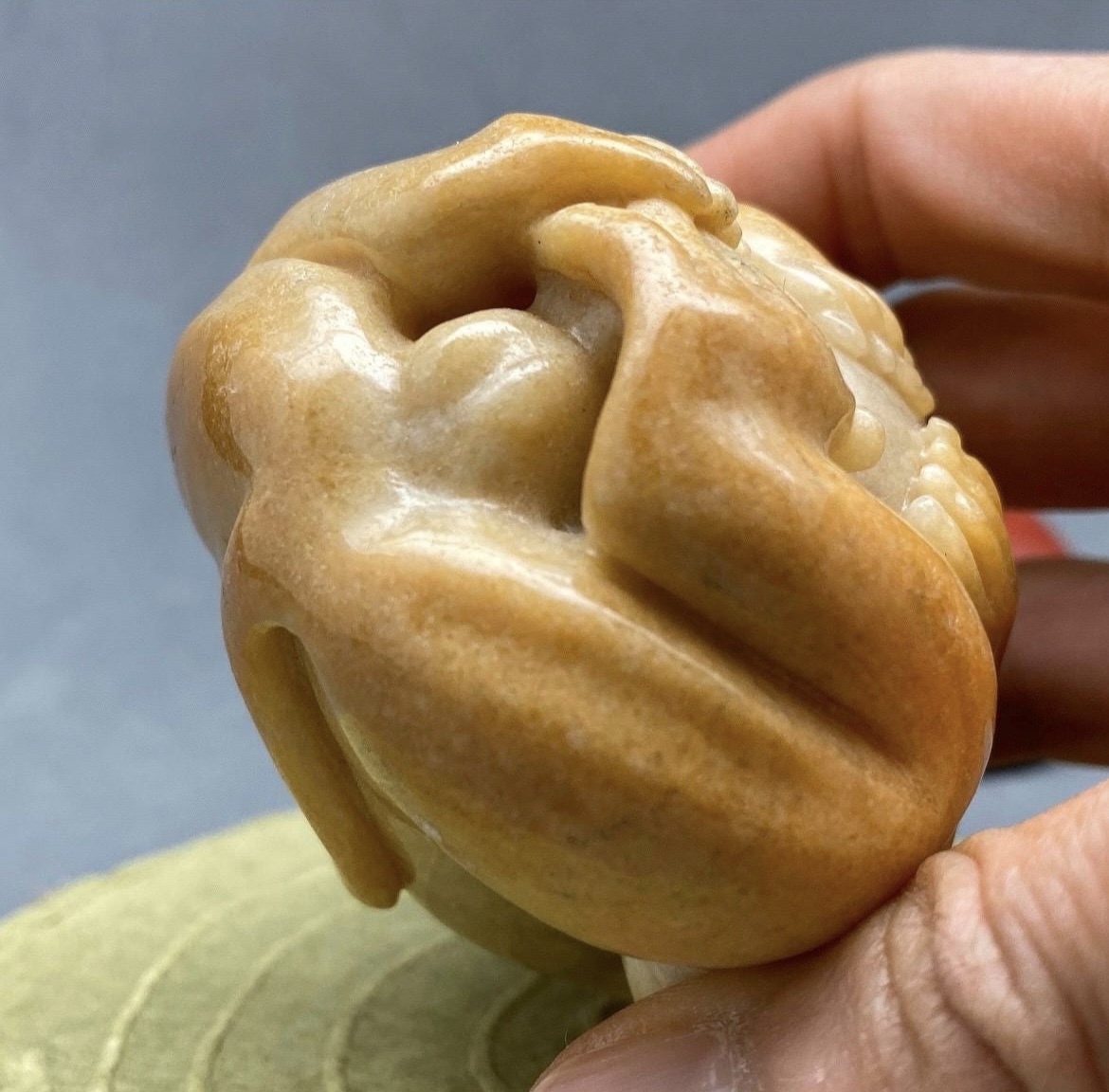 Yellow jadeite monkey and peach sculpture, collectible