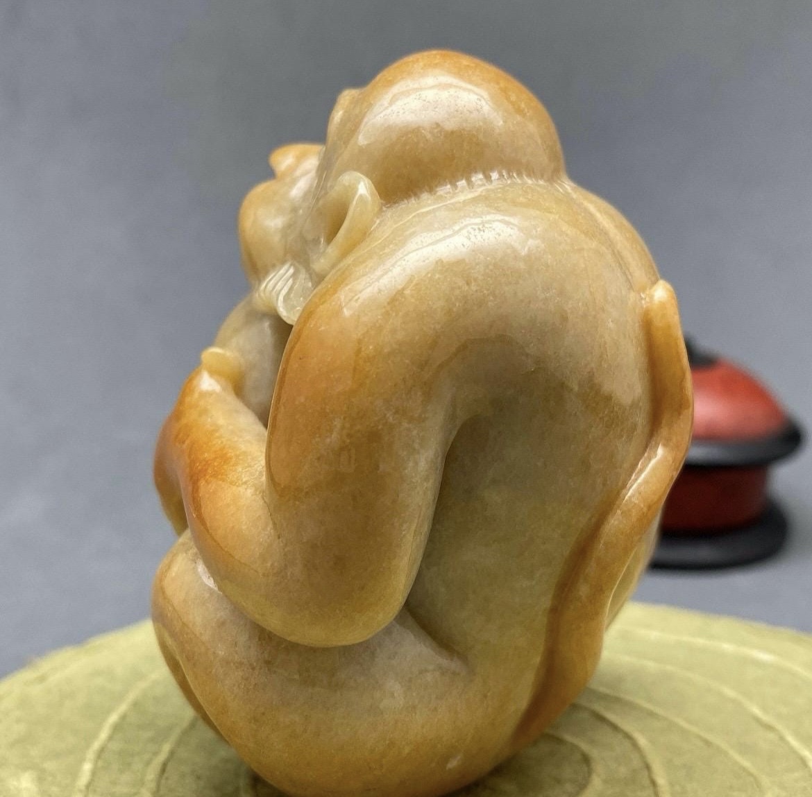 Yellow jadeite monkey and peach sculpture, collectible