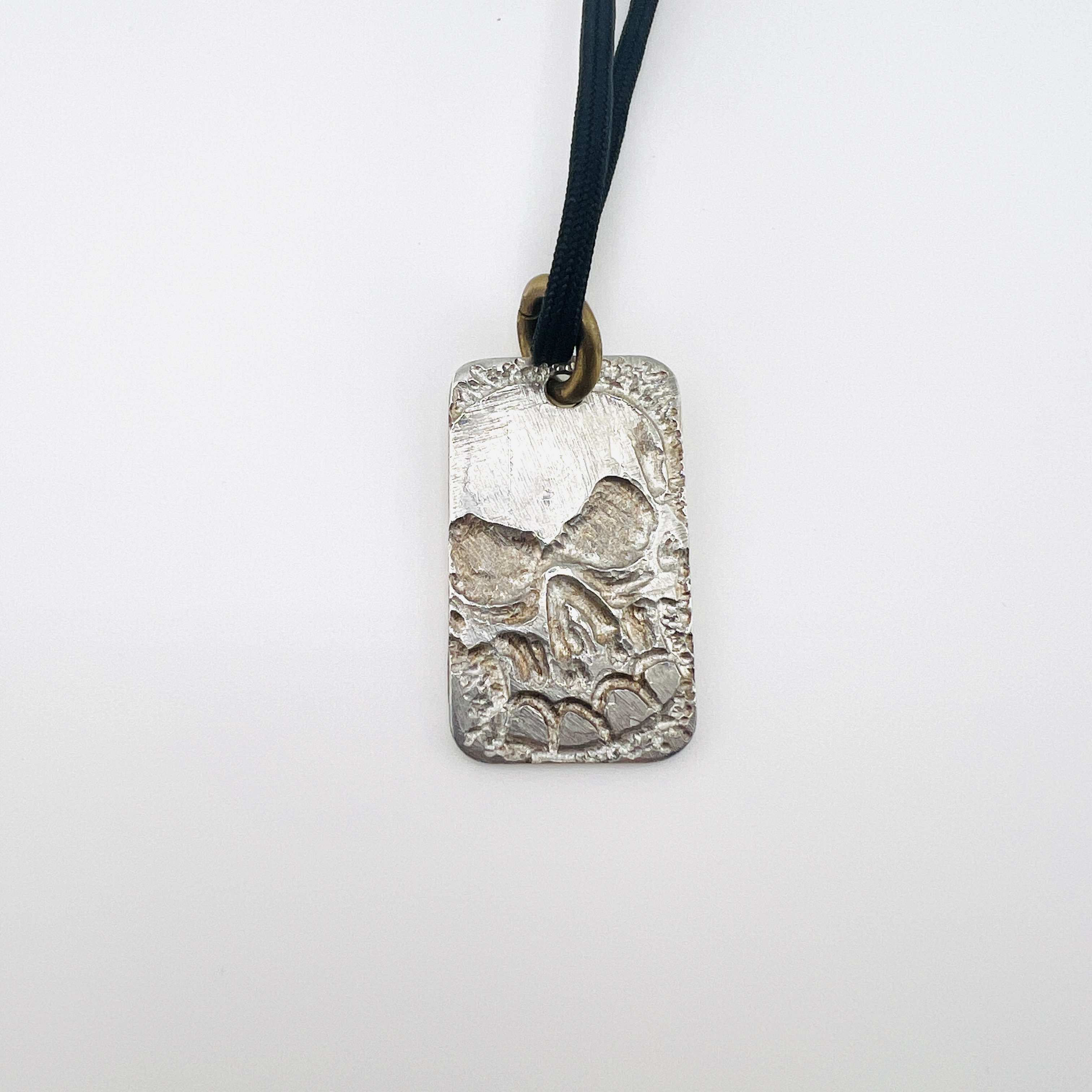 Skull dog tag pendant necklace, made of gun barrel steel