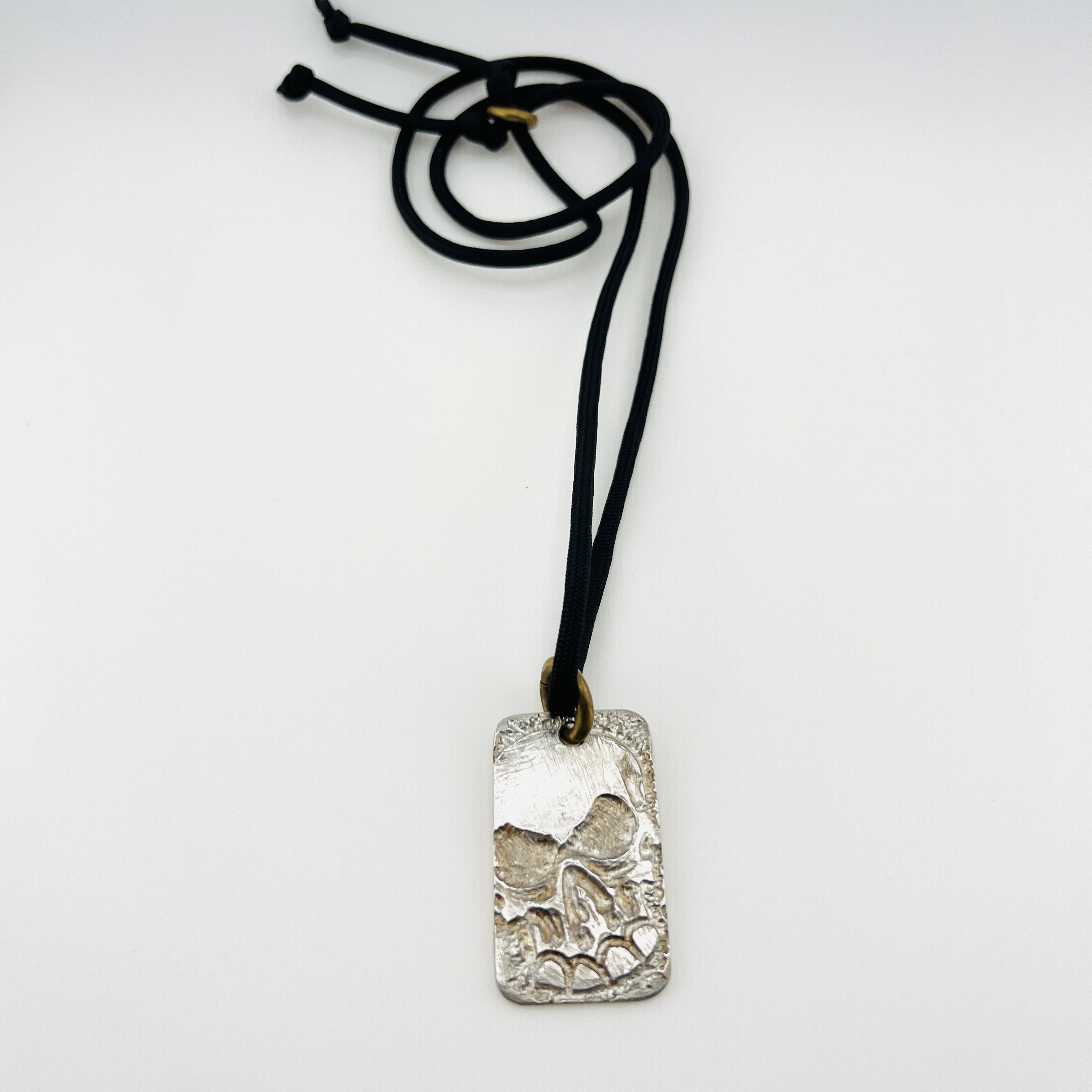 Skull dog tag pendant necklace, made of gun barrel steel
