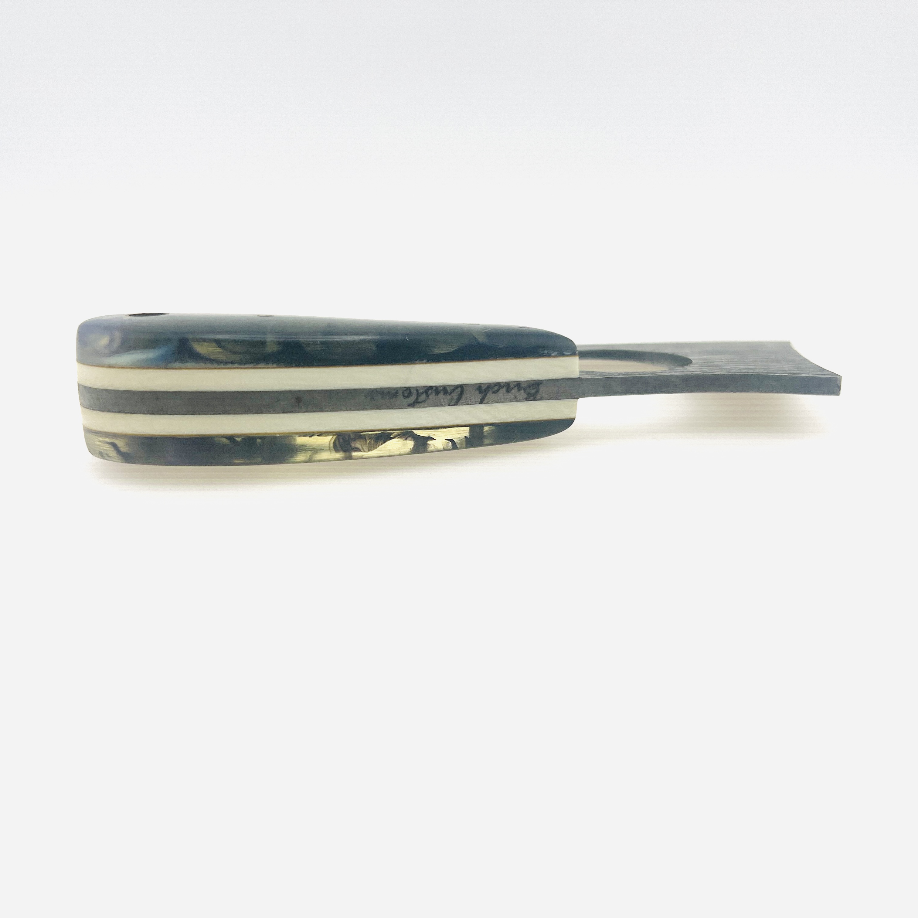 Morden skinner knife with textured blade and Kydex sheath