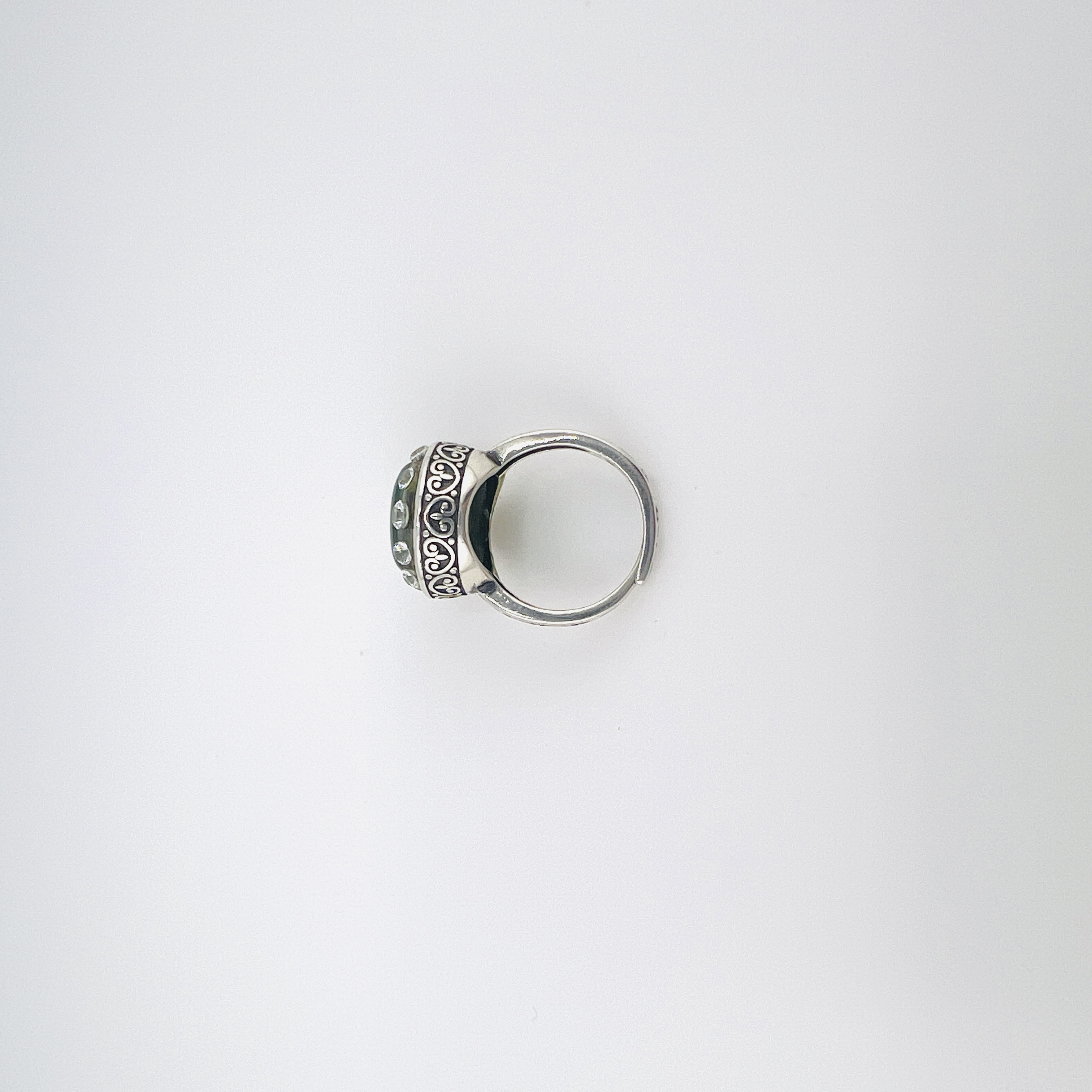 Heart shaped jadeite and diamond ring in silver setting