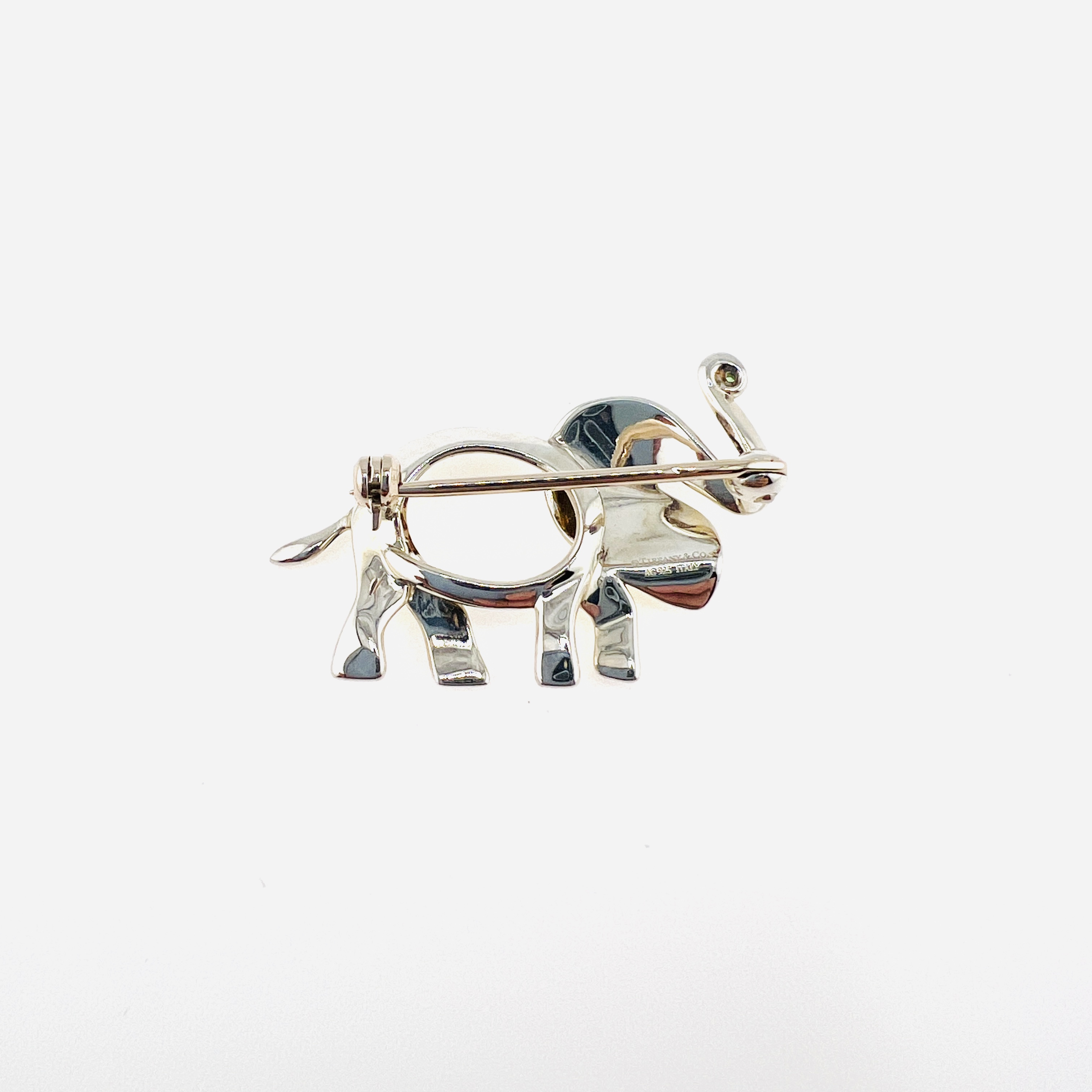 Tiffany & Co. Elephant brooch in sterling silver and green Peridot 