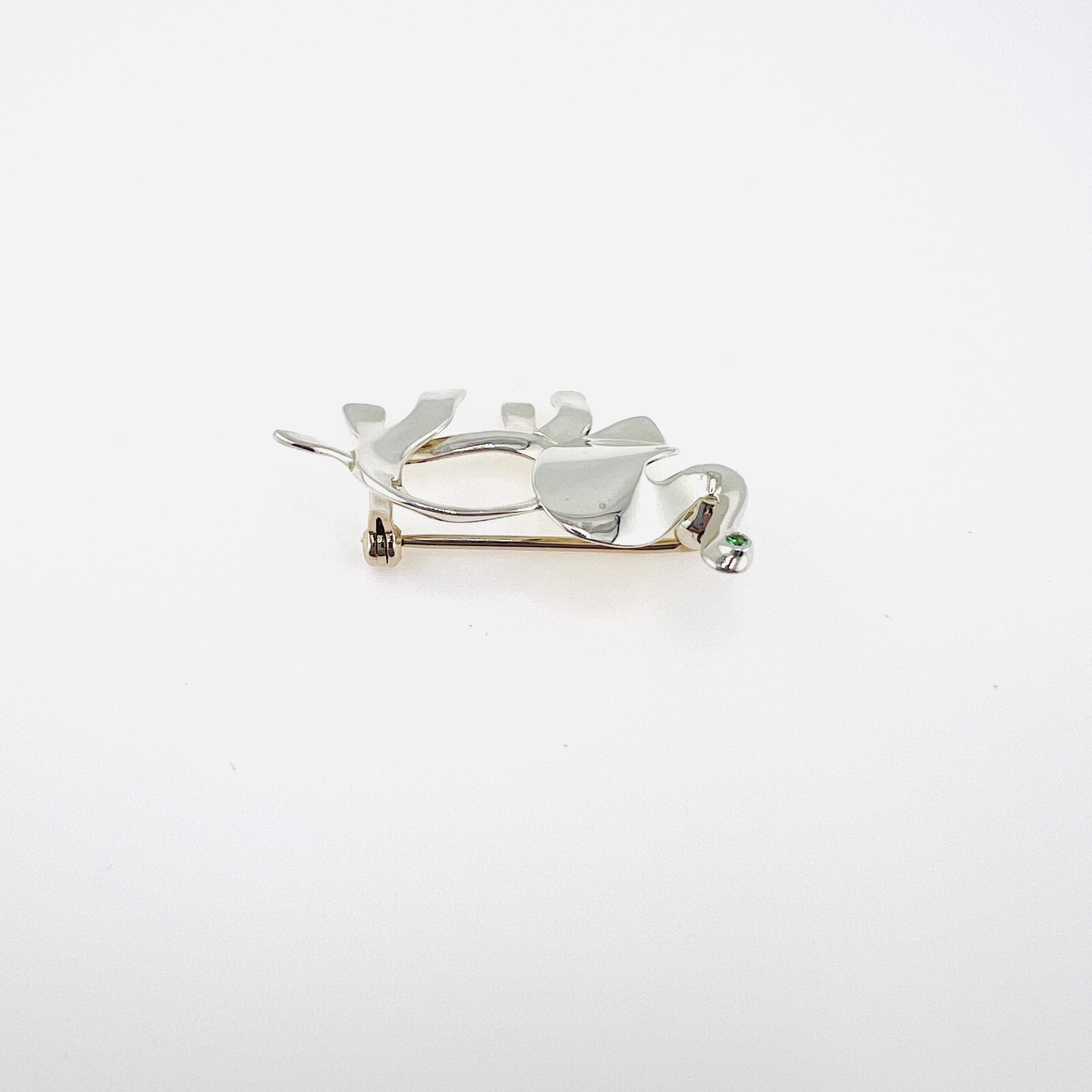 Tiffany & Co. Elephant brooch in sterling silver and green Peridot 