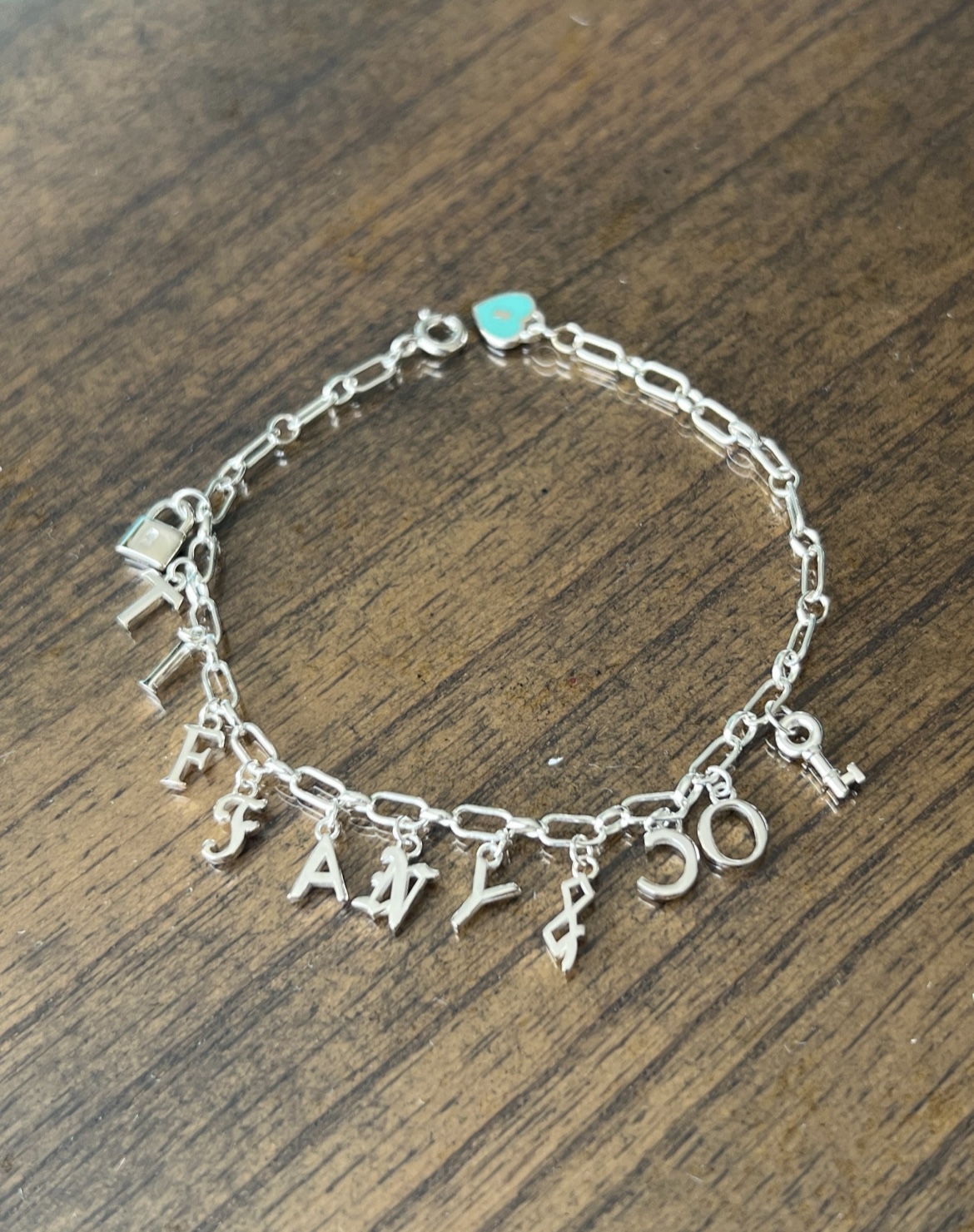 Tiffany & Co. sterling silver Lock and blue heart bracelet, size M