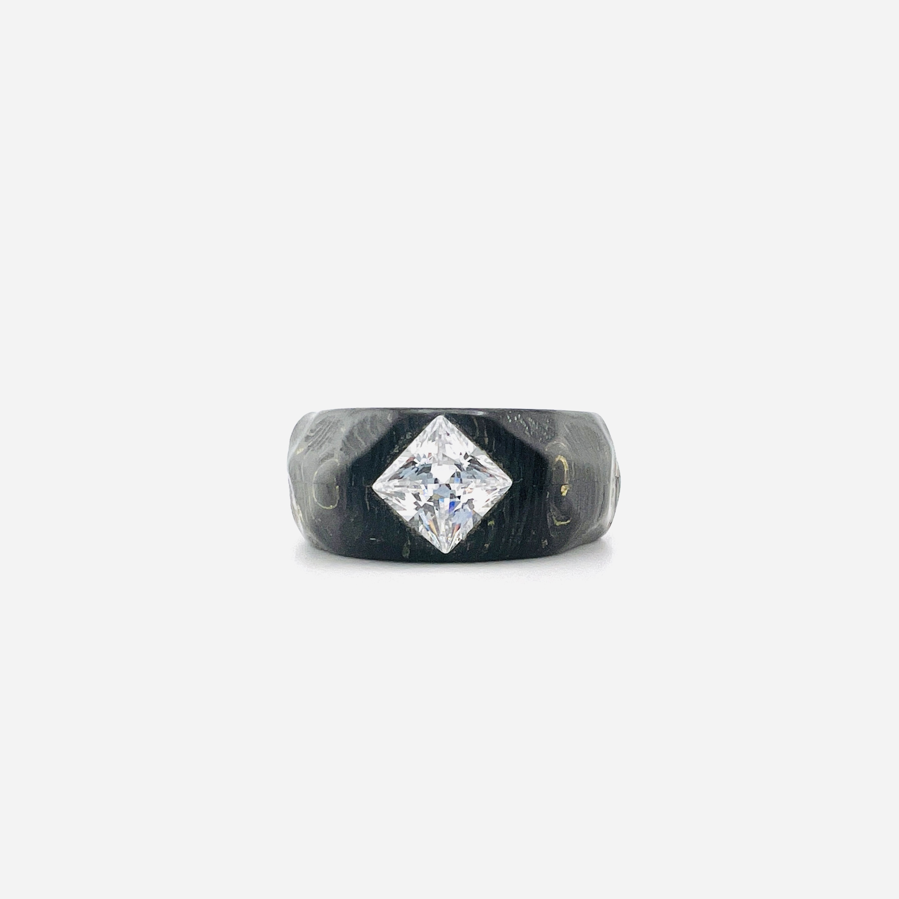 Princess cut diamond ring in carbon fiber band setting