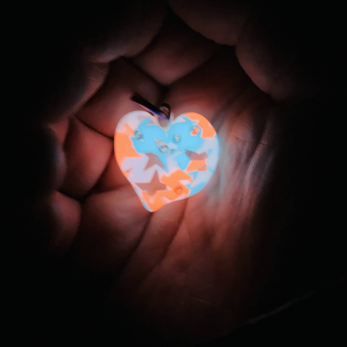 The star in heart pendant, glow in the dark with tri-color stars