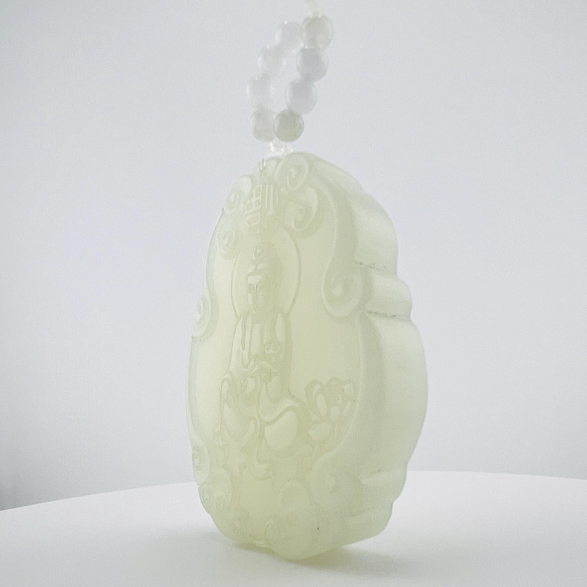 White jade Buddha pendant