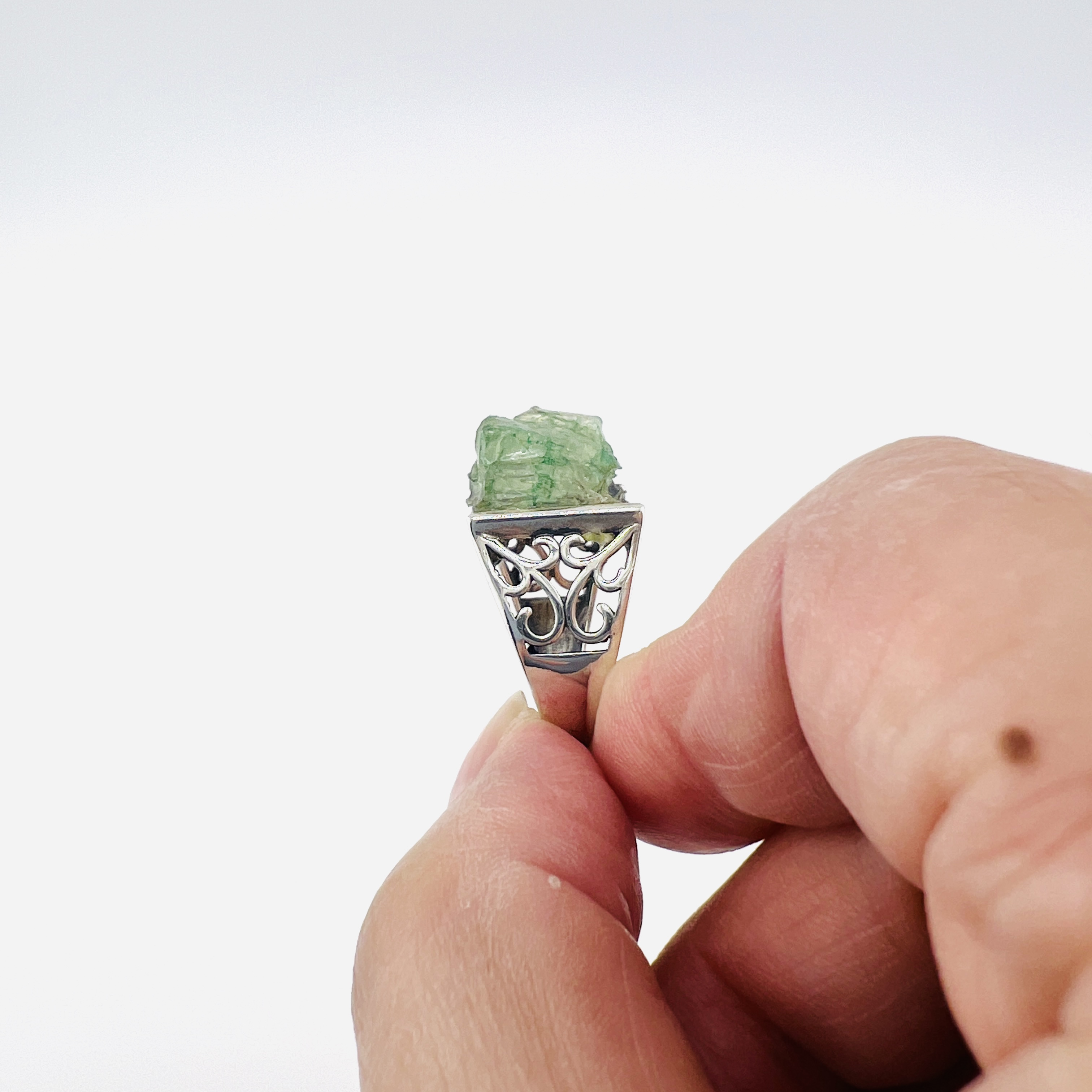 Raw green emerald cabochon and silver ring