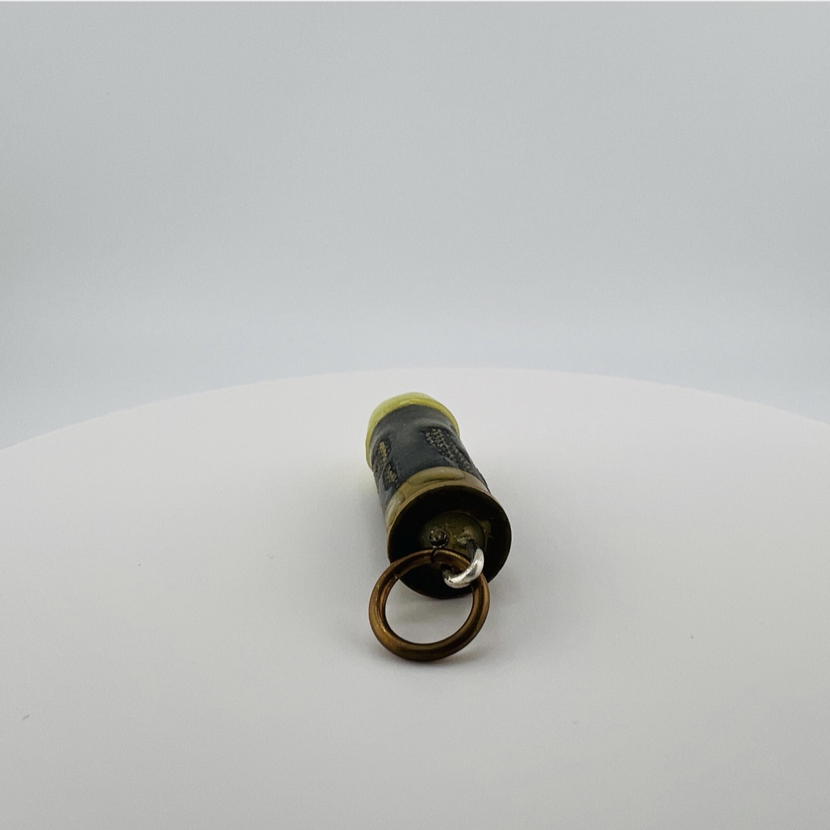 Zombier killer bullet pendant, resin, micarta, bras, and silver