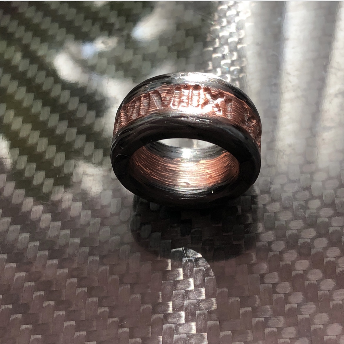 Time traveler carbon copper ring