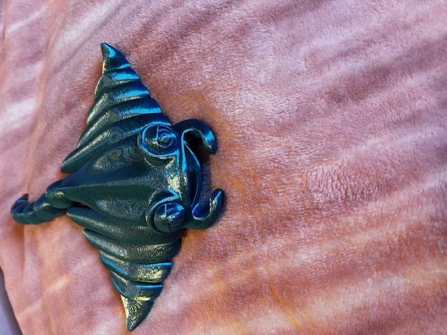 Metallic Triangular Fantasy Figurine