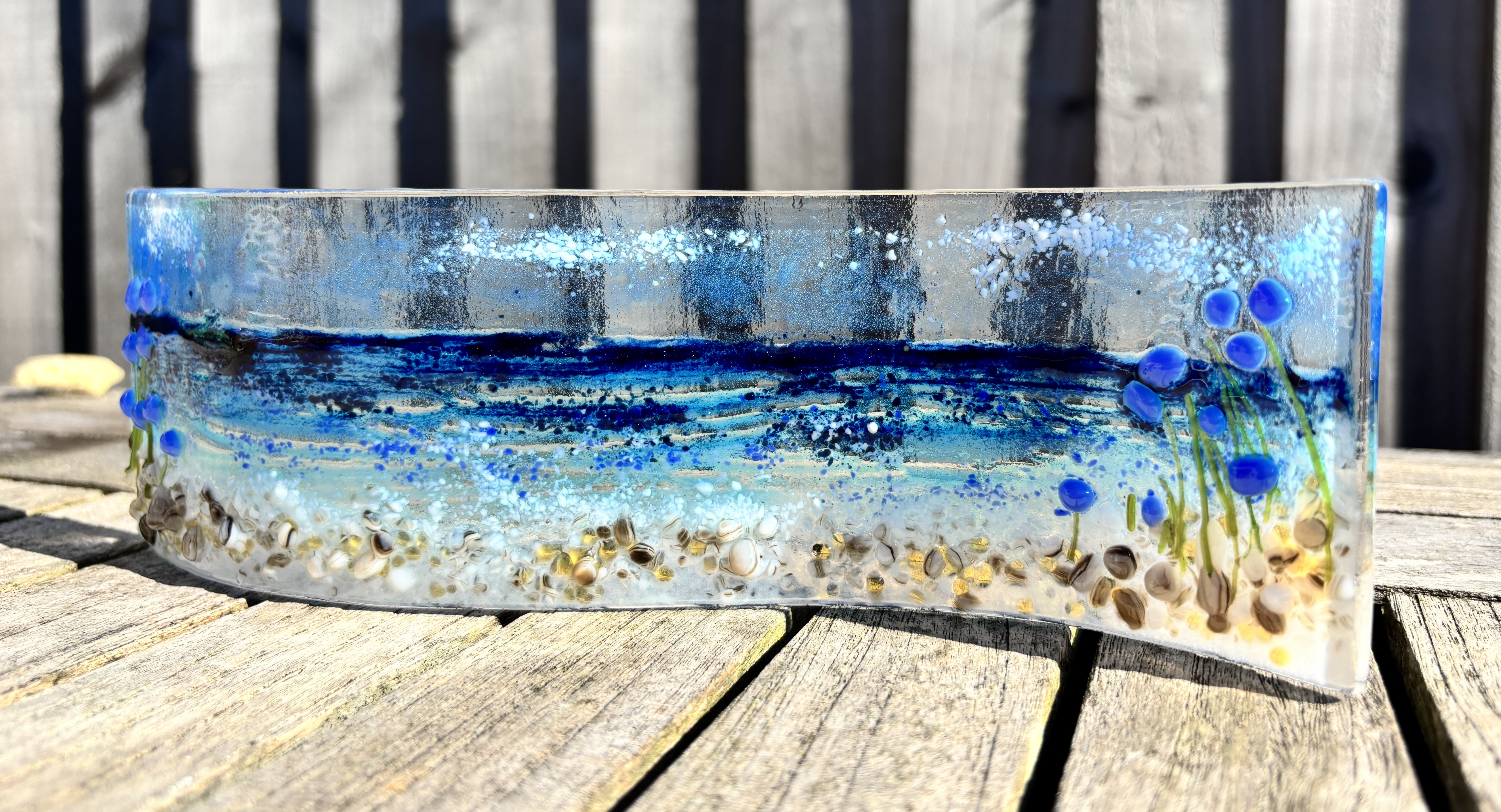 Seascape wave with blue flower accents