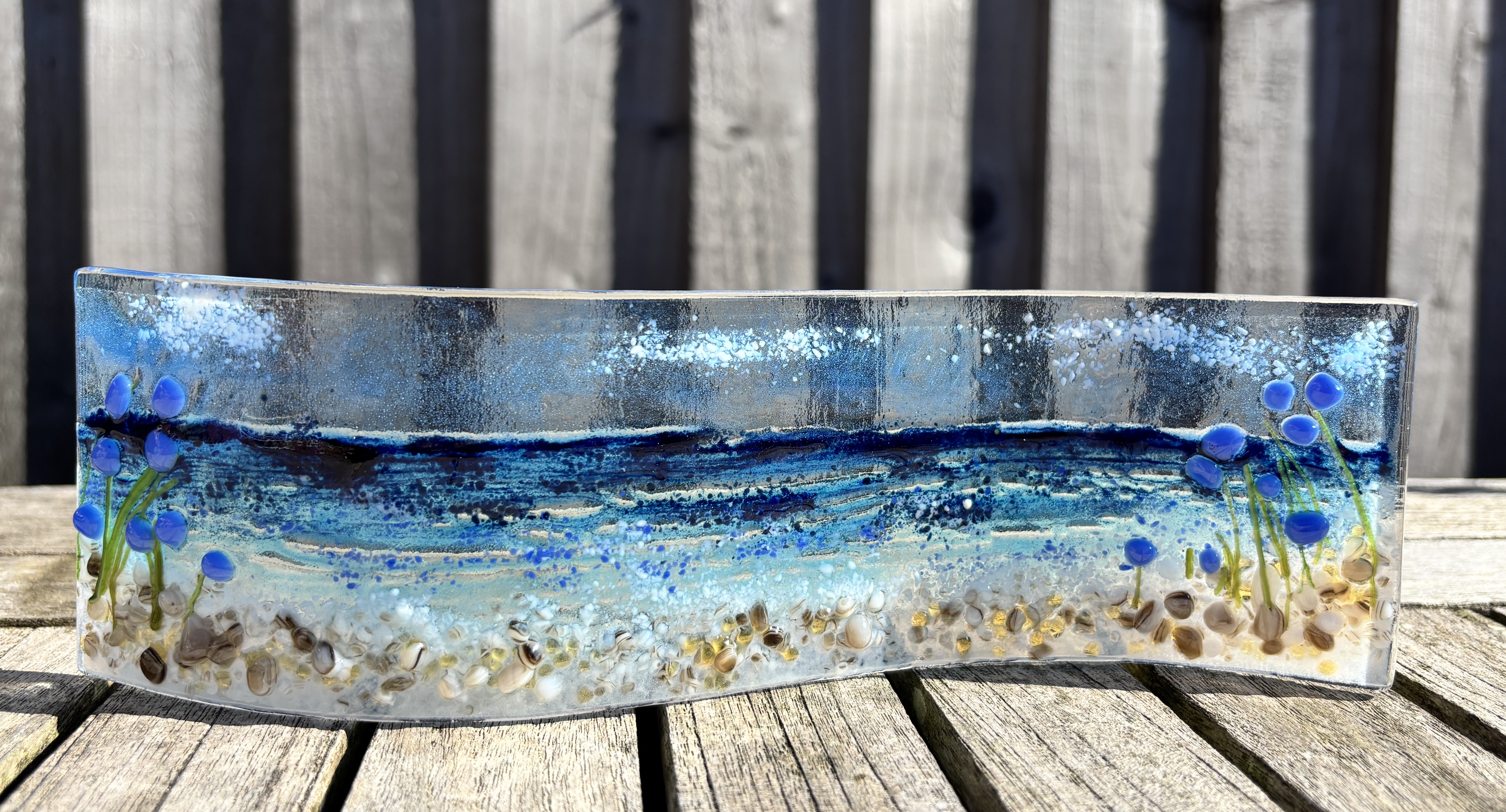 Seascape wave with blue flower accents