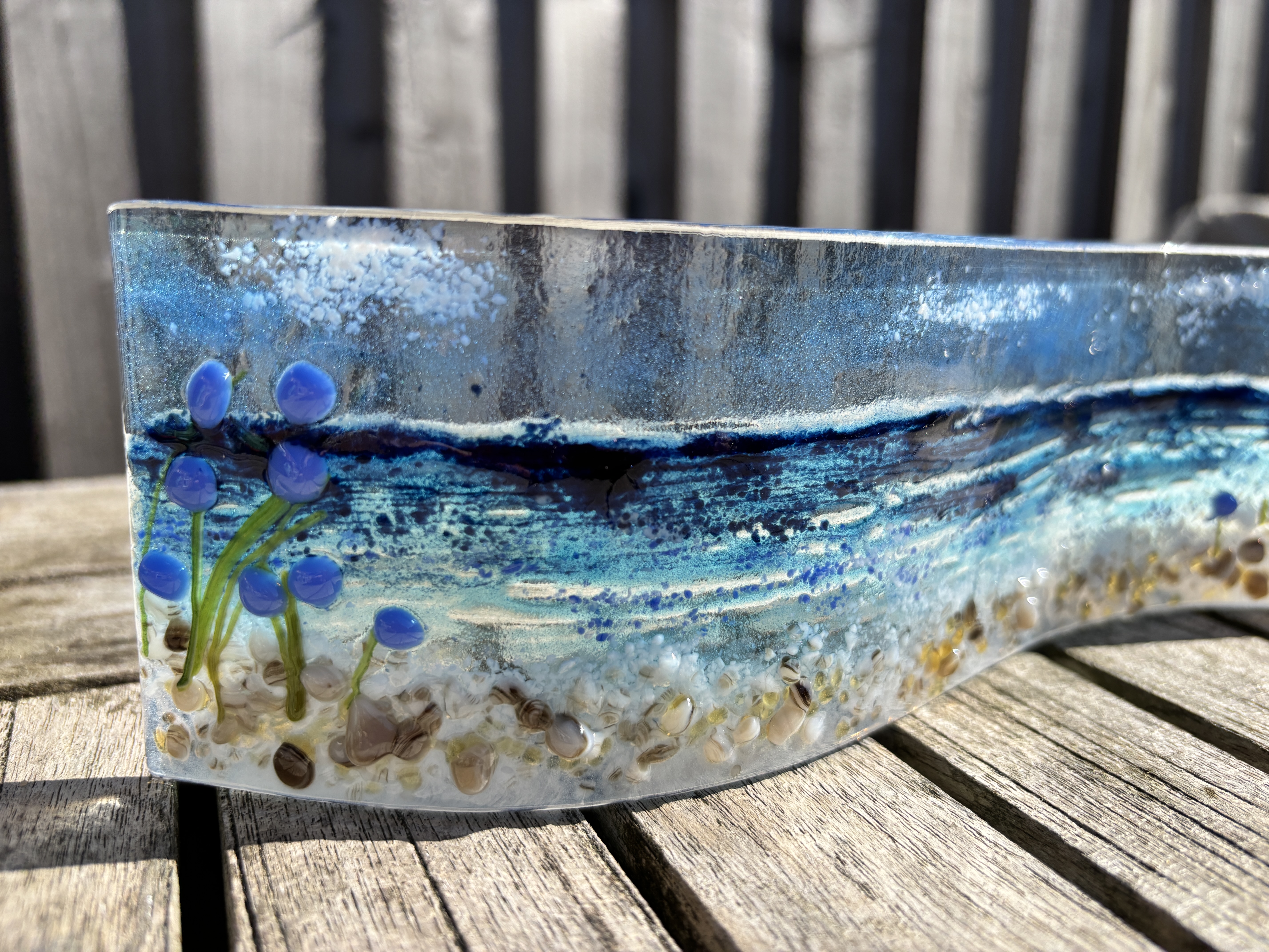 Seascape wave with blue flower accents