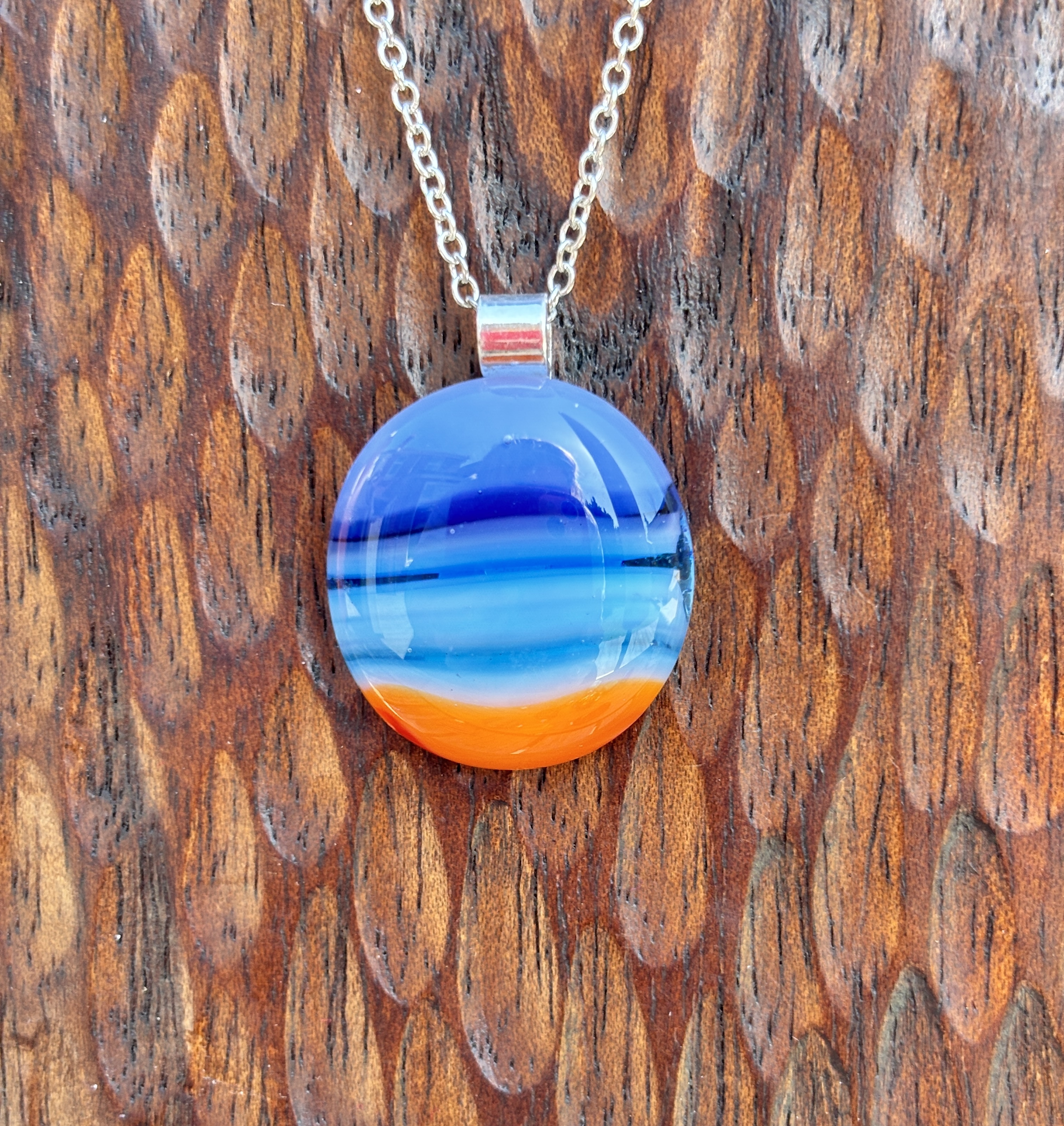 Blue and orange stripes with silver plated bail