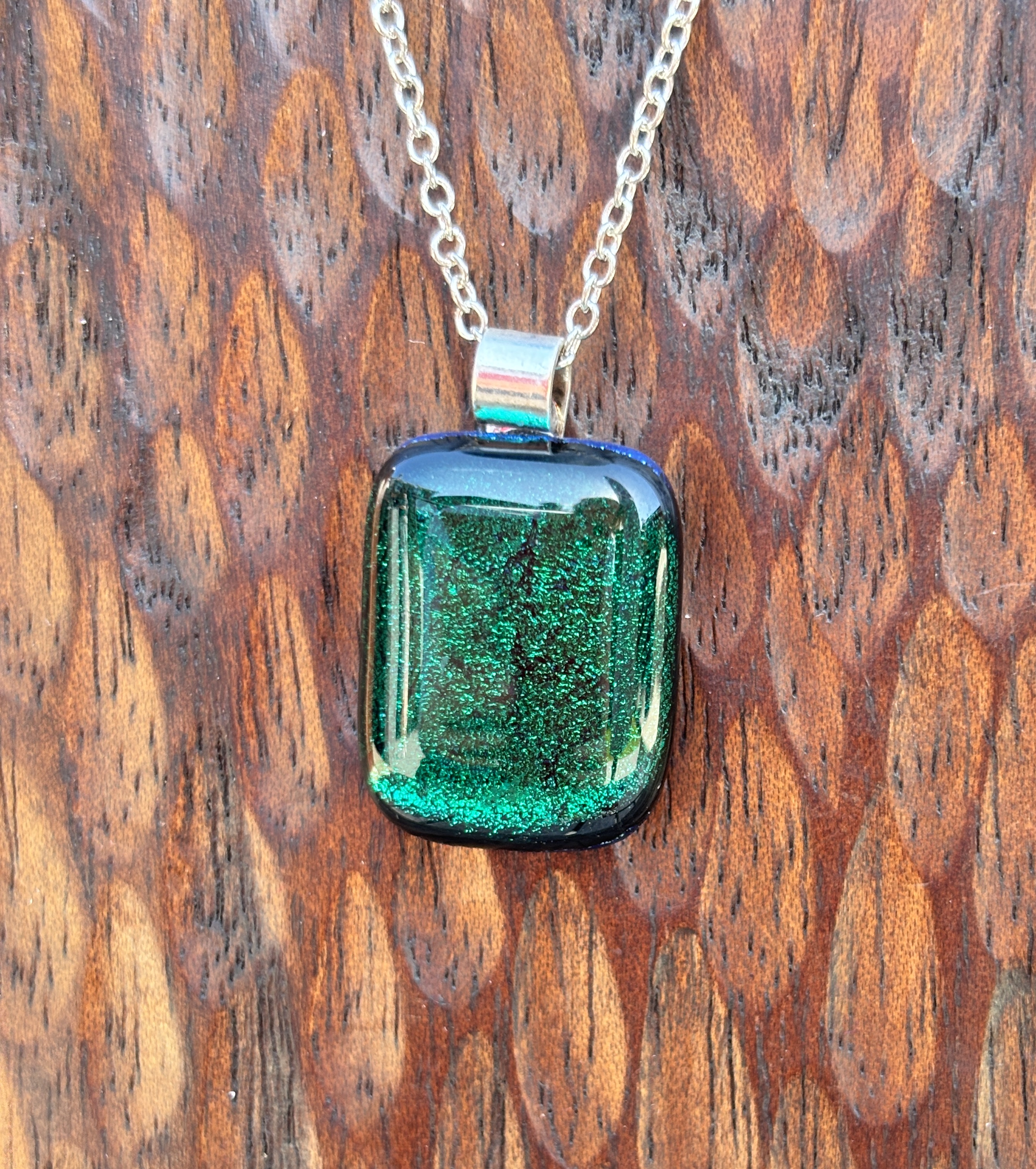 Dark green dichroic