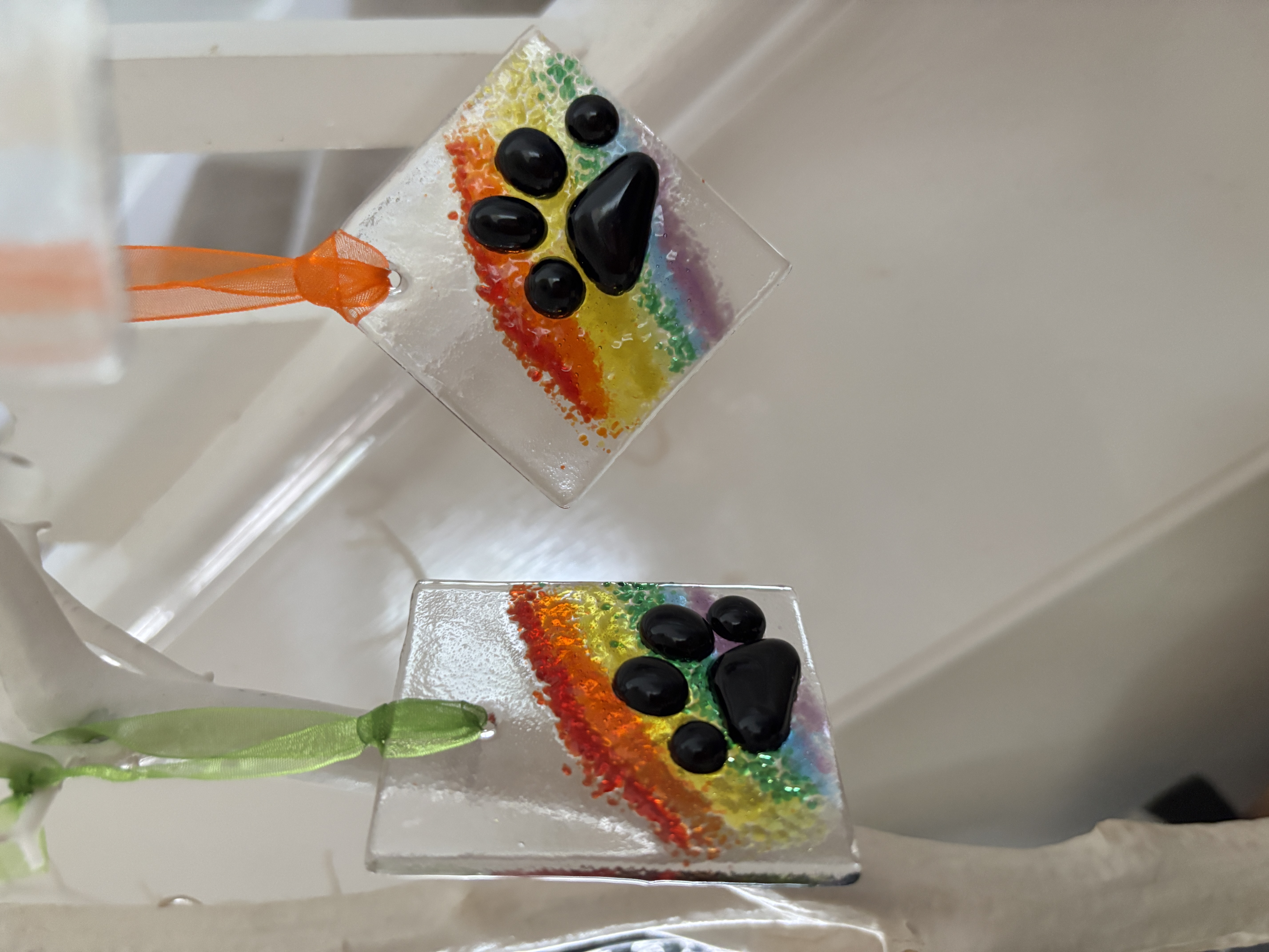 Rainbow Paw Print Glass Ornament