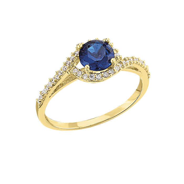 Anillo de oro con zafiro azul y diamantes